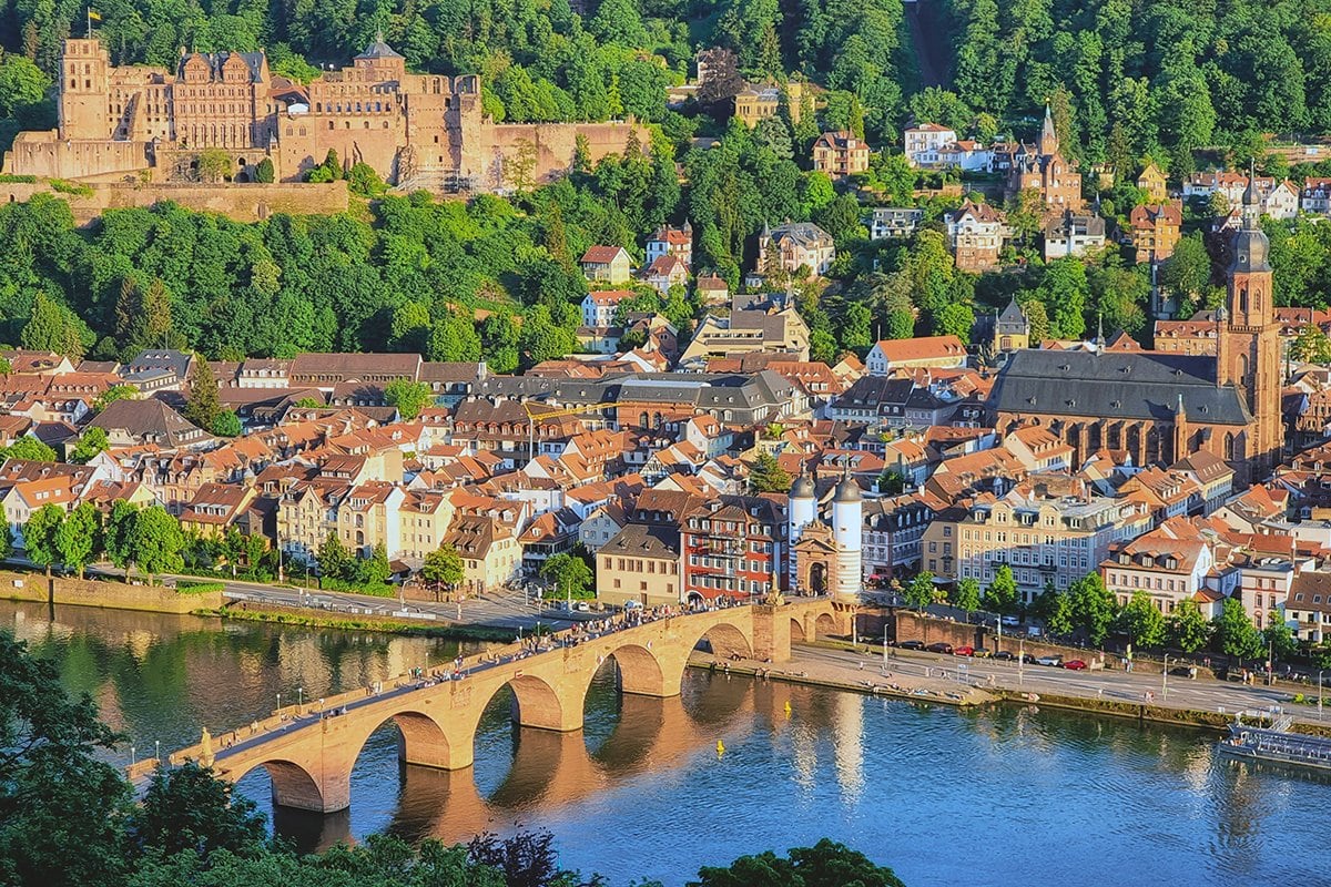 Heidelberg Castle 3 Heidelberg Castle, Alte Brücke, and Old Town seen from the Philosophenweg in golden hour light