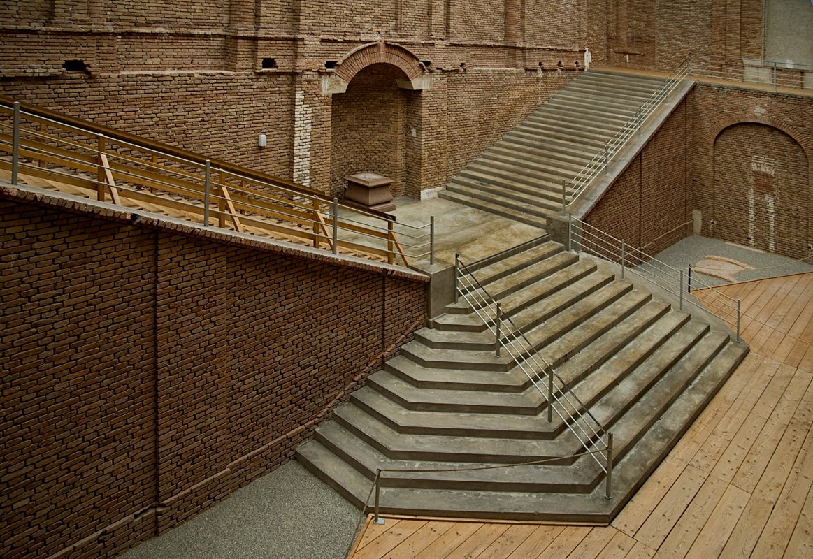 The Castles of King Ludwig II 7 The unfinished northern staircase at Herrenchiemsee New Palace, where bare brickwork stops mid-flight