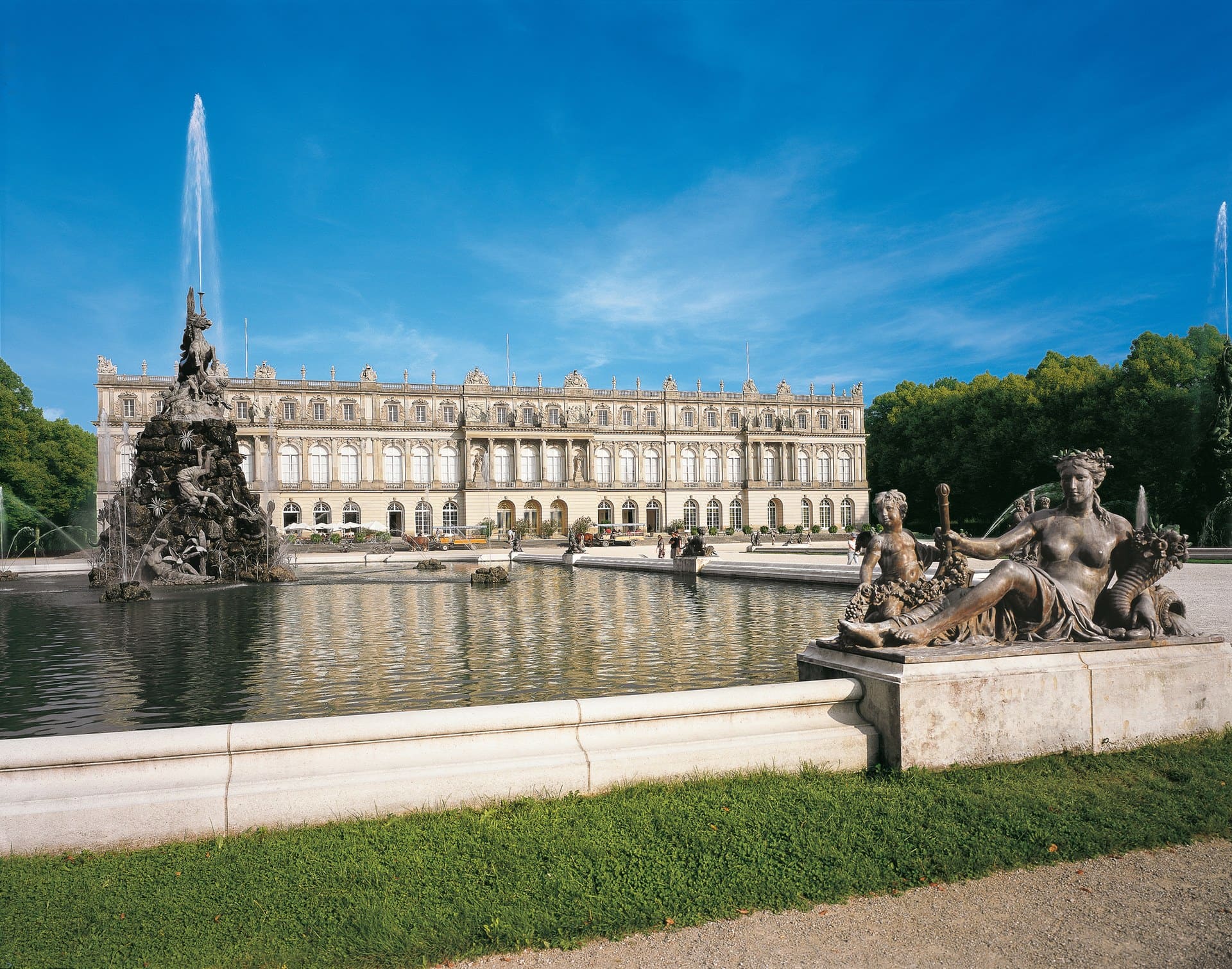 Herrenchiemsee New Palace 3 West façade of Herrenchiemsee New Palace with the Fama fountain in the foreground