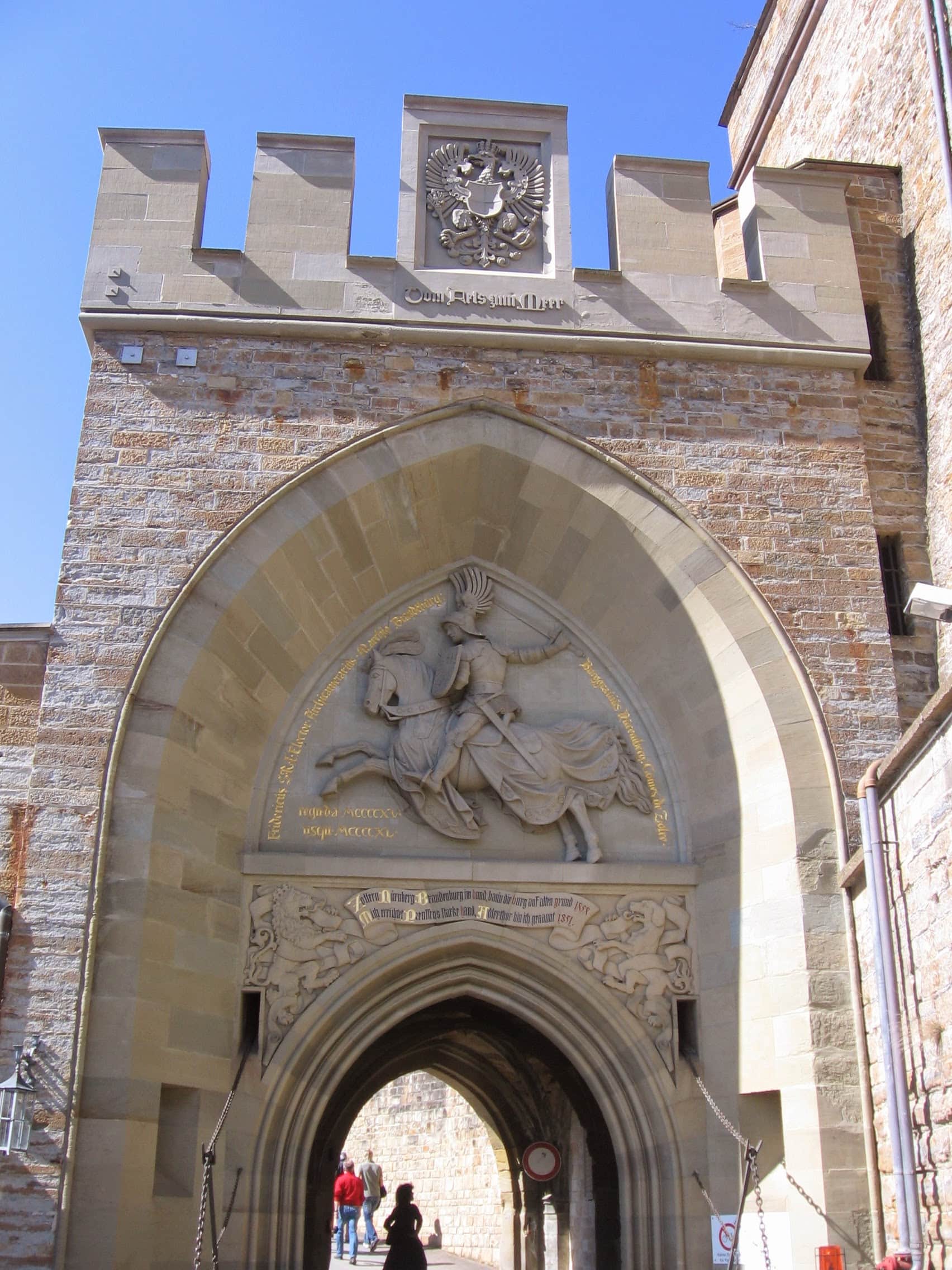 Hohenzollern Castle 5 Inner gateway arch of Hohenzollern Castle's main gate with a relief of Frederick I of Brandenburg on horseback in the tympanum and the Hohenzollern eagle coat of arms above