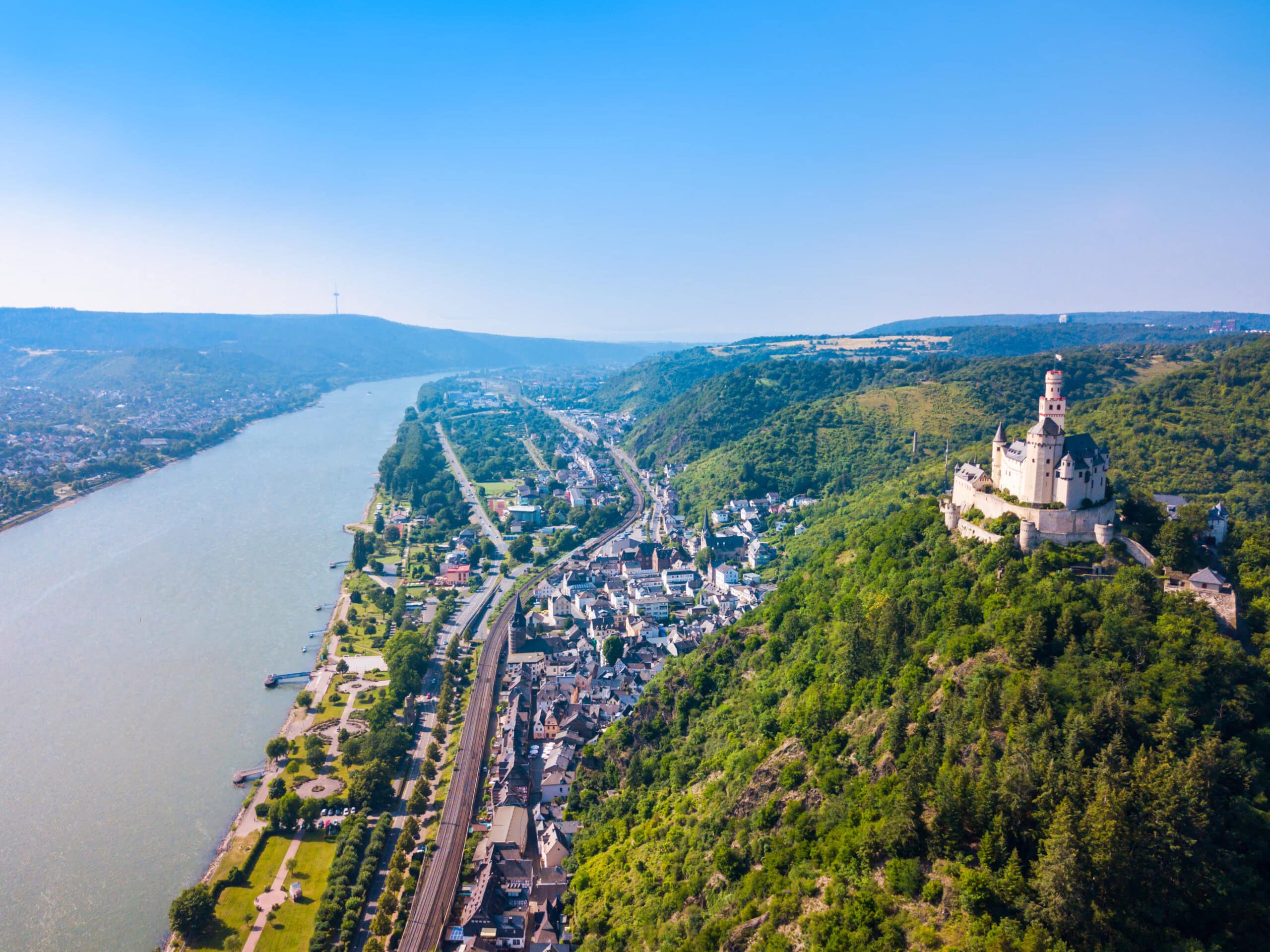The Rhine as Contested Territory: Castles, Tolls, and the Collapse of Imperial Authority 4 Aerial view of Marksburg Castle above Braubach with the Rhine valley extending northward toward Koblenz