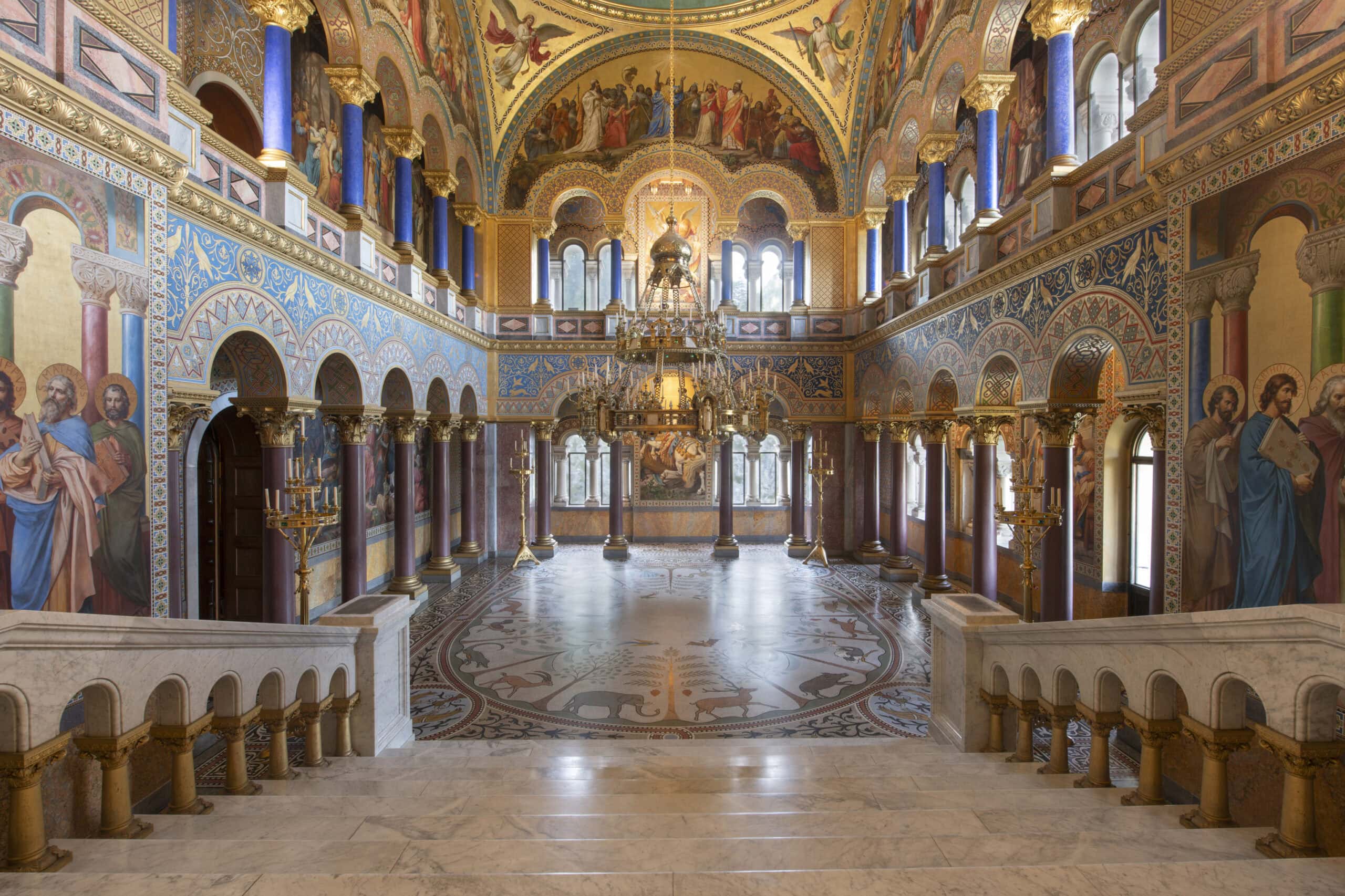 Neuschwanstein Castle 6 Throne Hall of Neuschwanstein Castle showing the Byzantine-inspired apse, gilded mosaic floor depicting animals and plants, and the four-meter chandelier