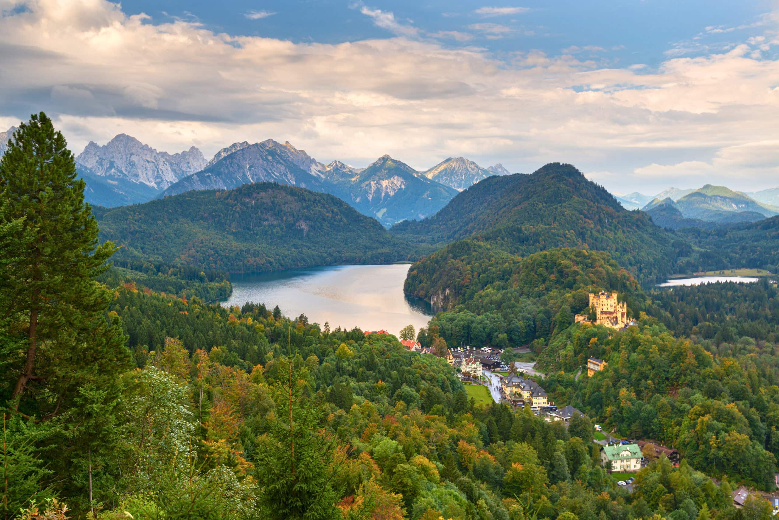 Neuschwanstein Castle 2 View from the Neuschwanstein Castle hillside looking down over Hohenschwangau Castle, the village of Hohenschwangau, the Alpsee lake, and the Bavarian Alpine peaks
