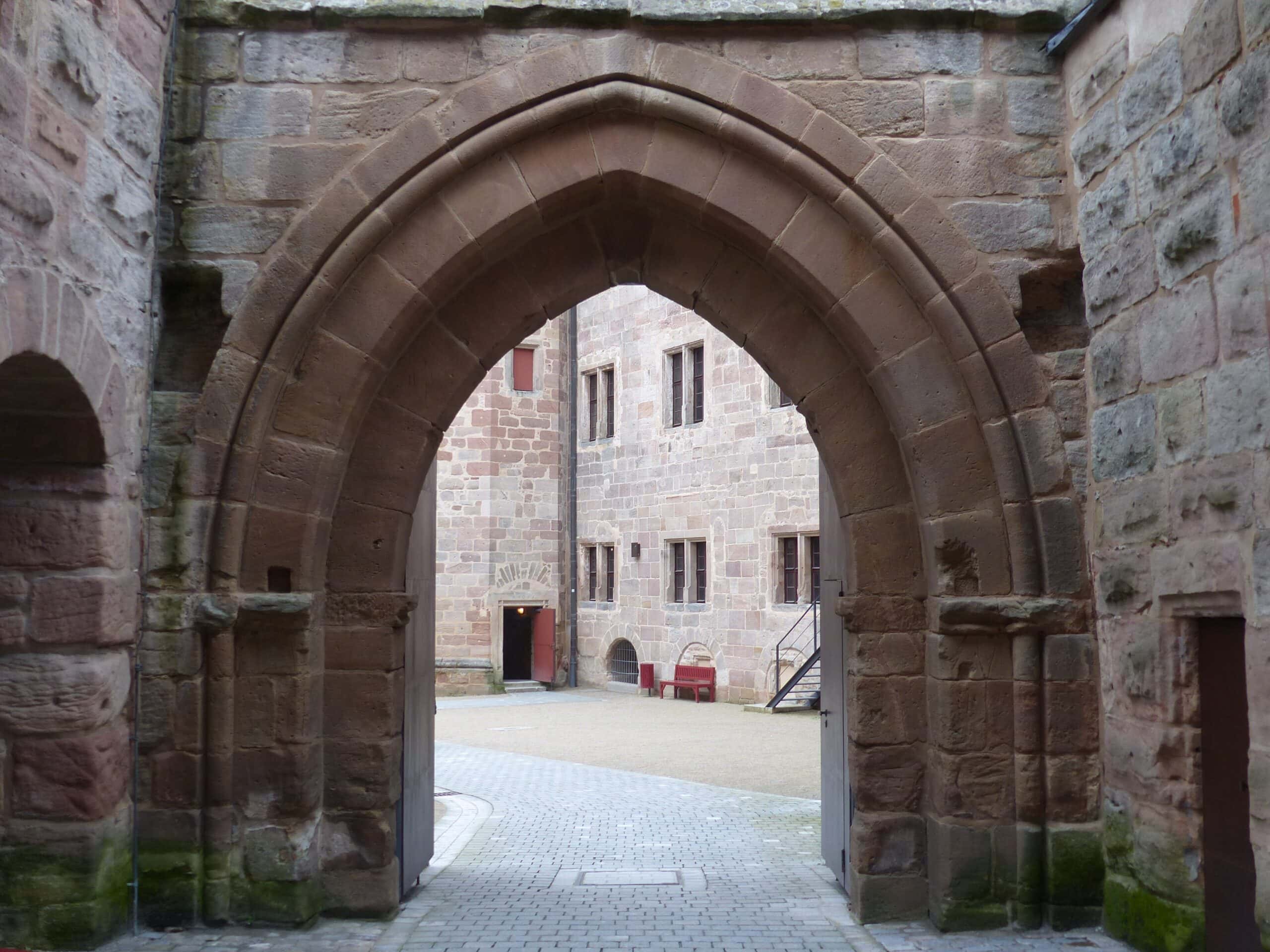 Cadolzburg Castle 2 Gothic pointed-arch inner gate at Cadolzburg with view through to the inner courtyard