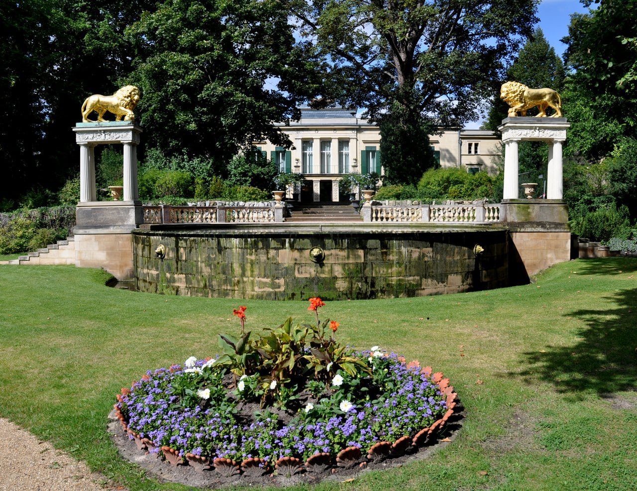 Glienicke Palace 3 The Lion Fountain at Glienicke, two gilded bronze lions on columns with the palace behind.