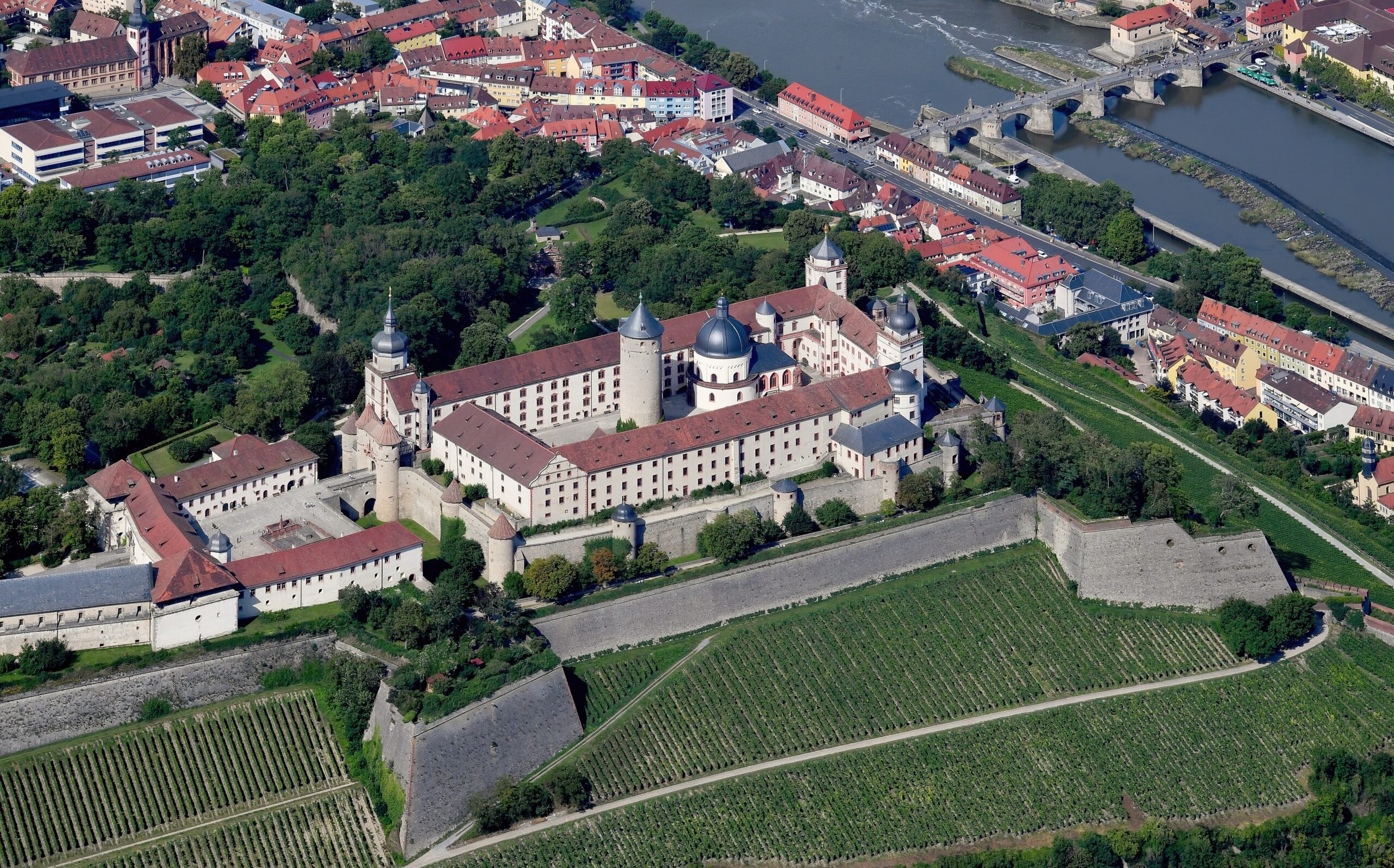 Marienberg Fortress 3 Aerial view of Marienberg Fortress from the southwest, showing the Kernburg, Vorburg, vineyards and the city of Würzburg with the Alte Mainbrücke beyond