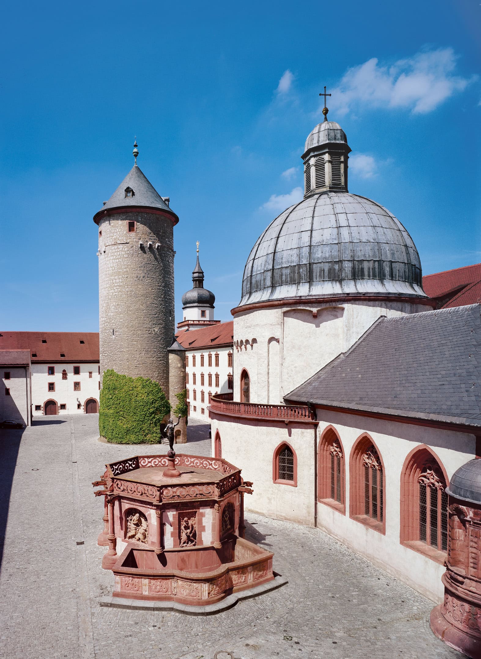 Marienberg Fortress 4 Inner courtyard of Marienberg Fortress with the medieval Bergfried, the cupola of the Marienkirche, and the Brunnenhaus