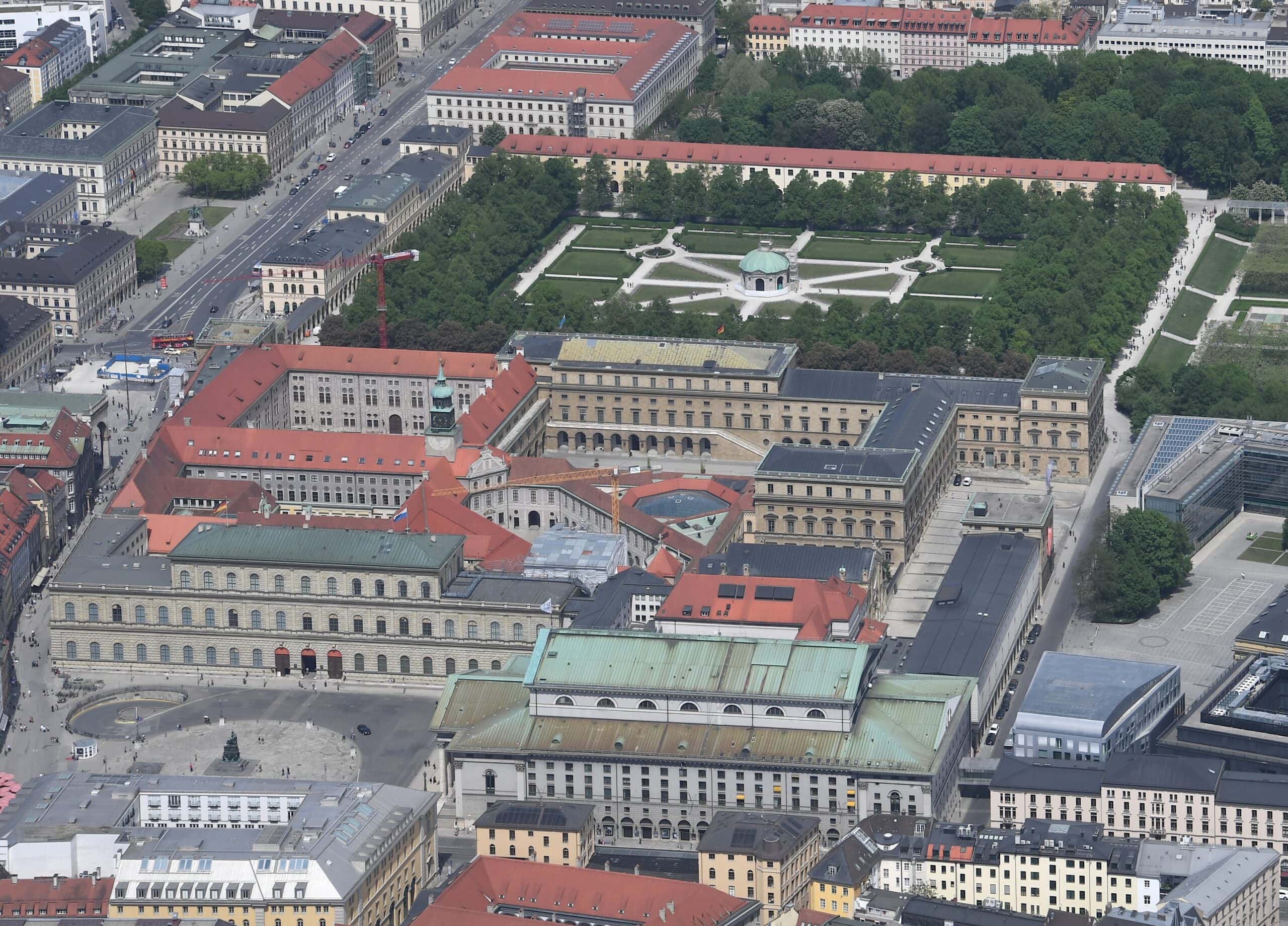 Aerial photograph of Munich Residenz showing the full ten-courtyard palace complex with the Hofgarten and Diana Temple to the north and central Munich around it