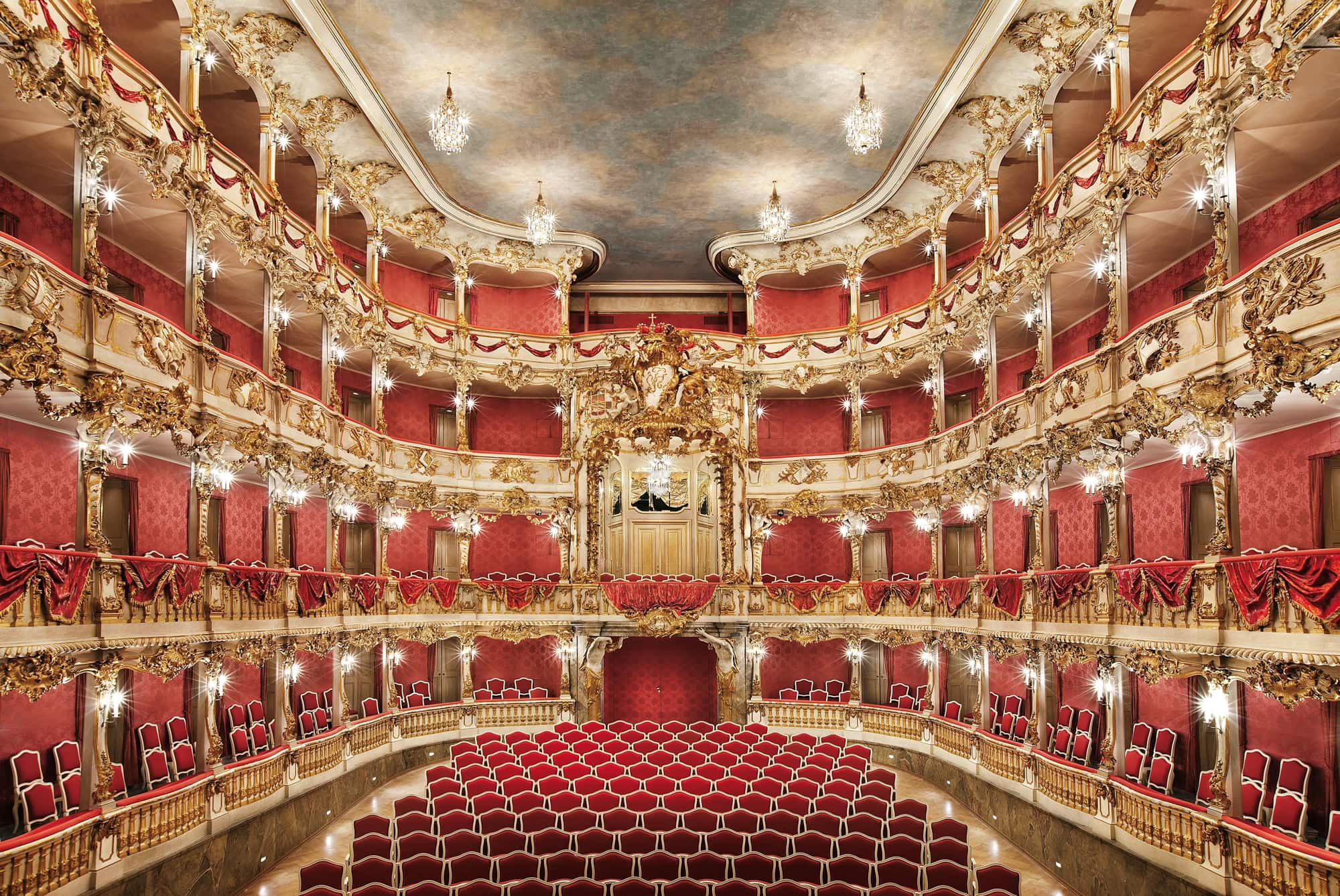 Four-tiered Rococo auditorium of the Cuvilliés Theatre with red velvet upholstery and gilded carved boxes