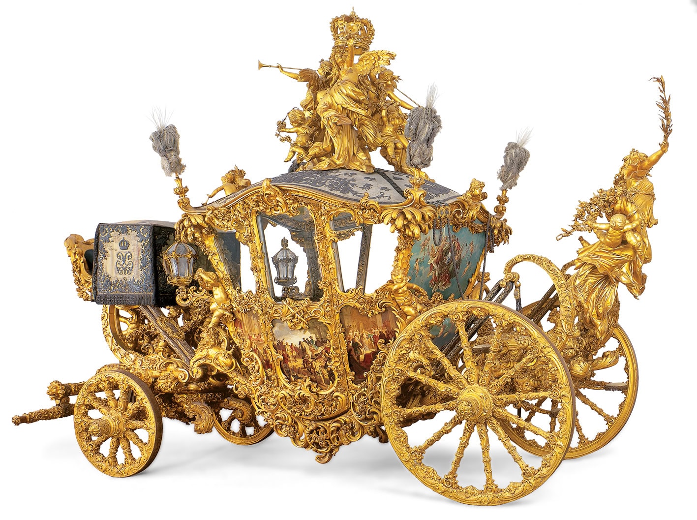 Nymphenburg Palace 8 King Ludwig II's gilded state coach in the Marstallmuseum at Nymphenburg Palace