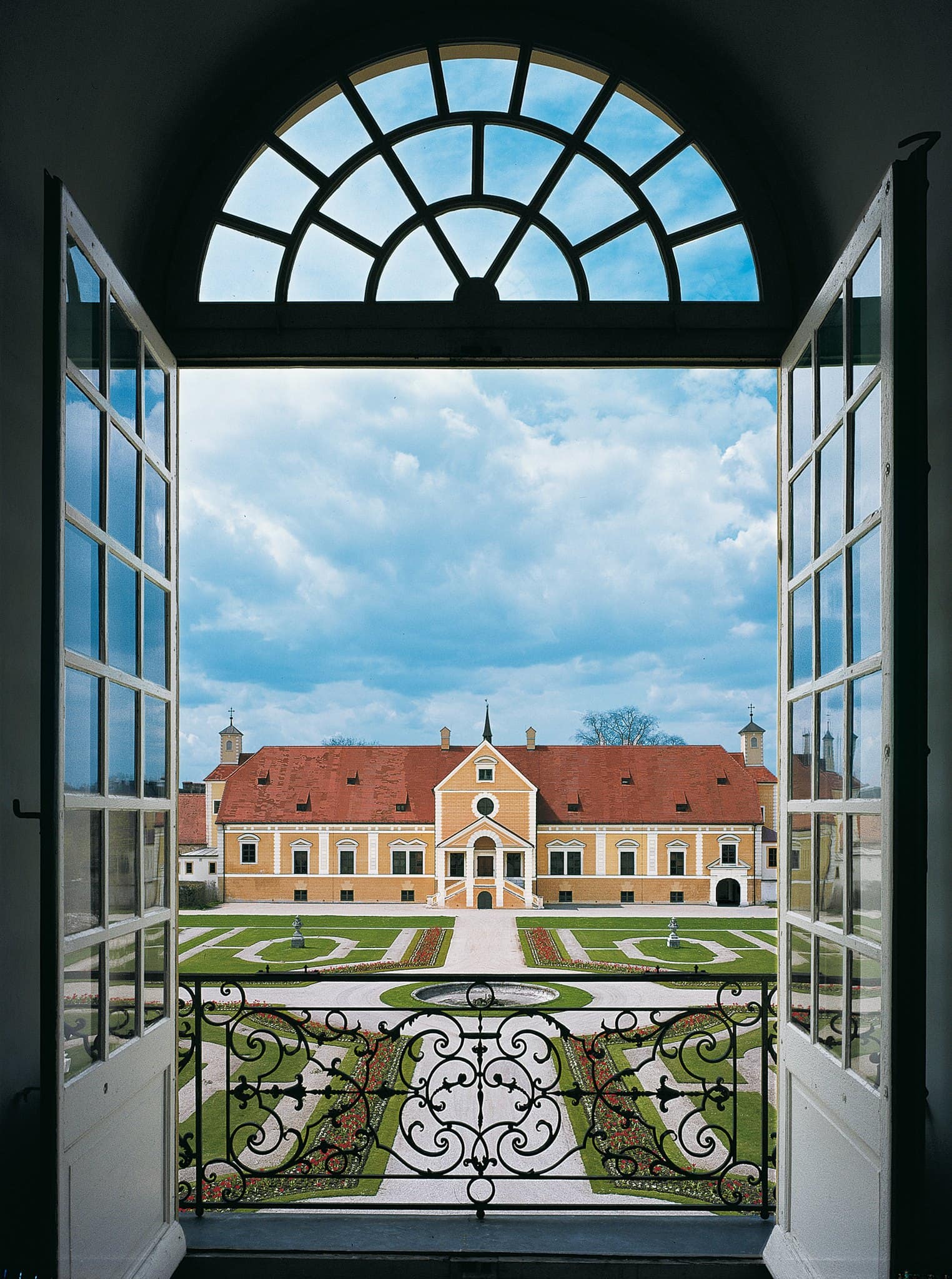 Schleissheim Palace 2 The Old Palace (Altes Schloss) at Schleissheim seen through an arched window across the garden
