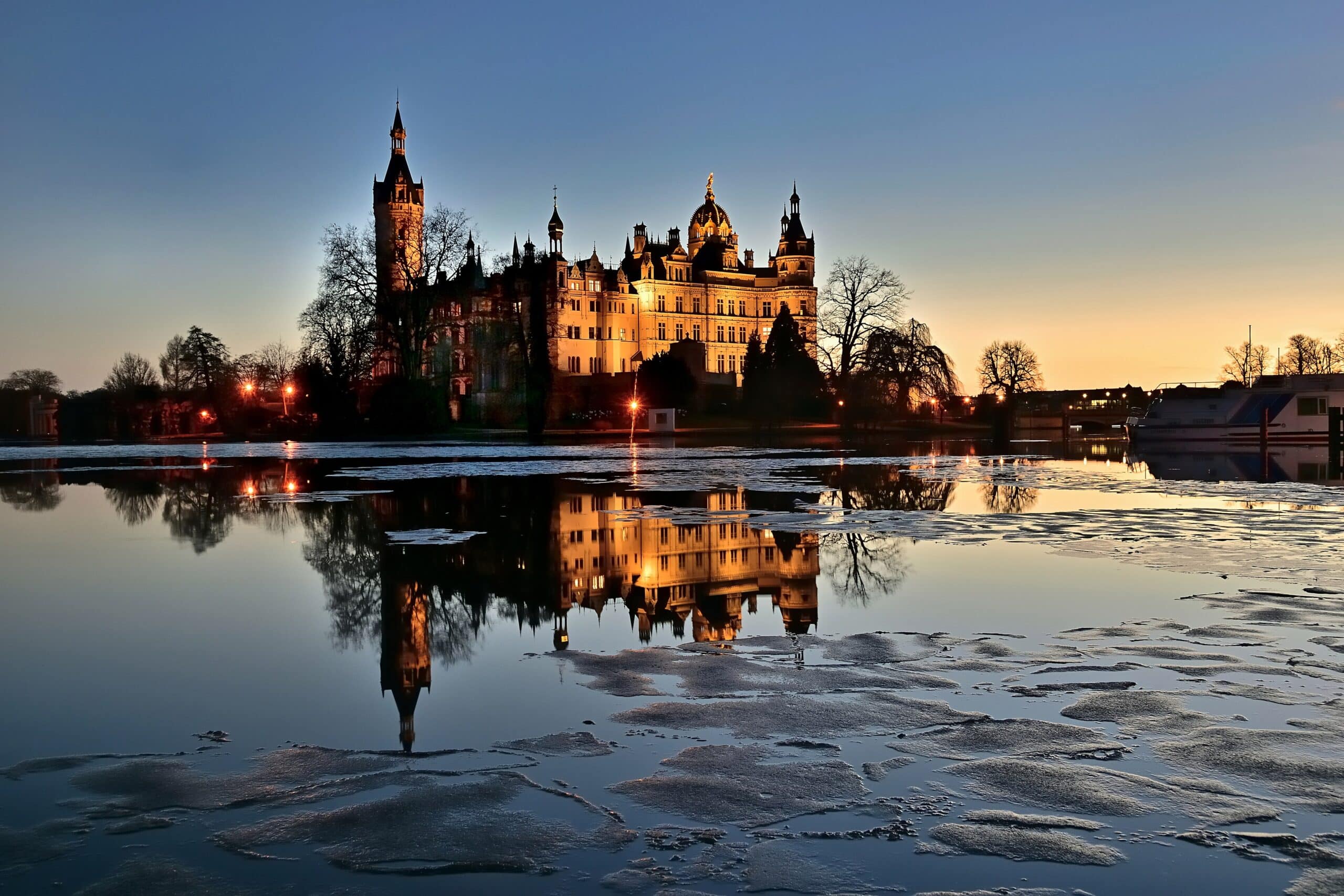 Schwerin Castle 6 Schwerin Castle reflected in the frozen Burgsee at sunset