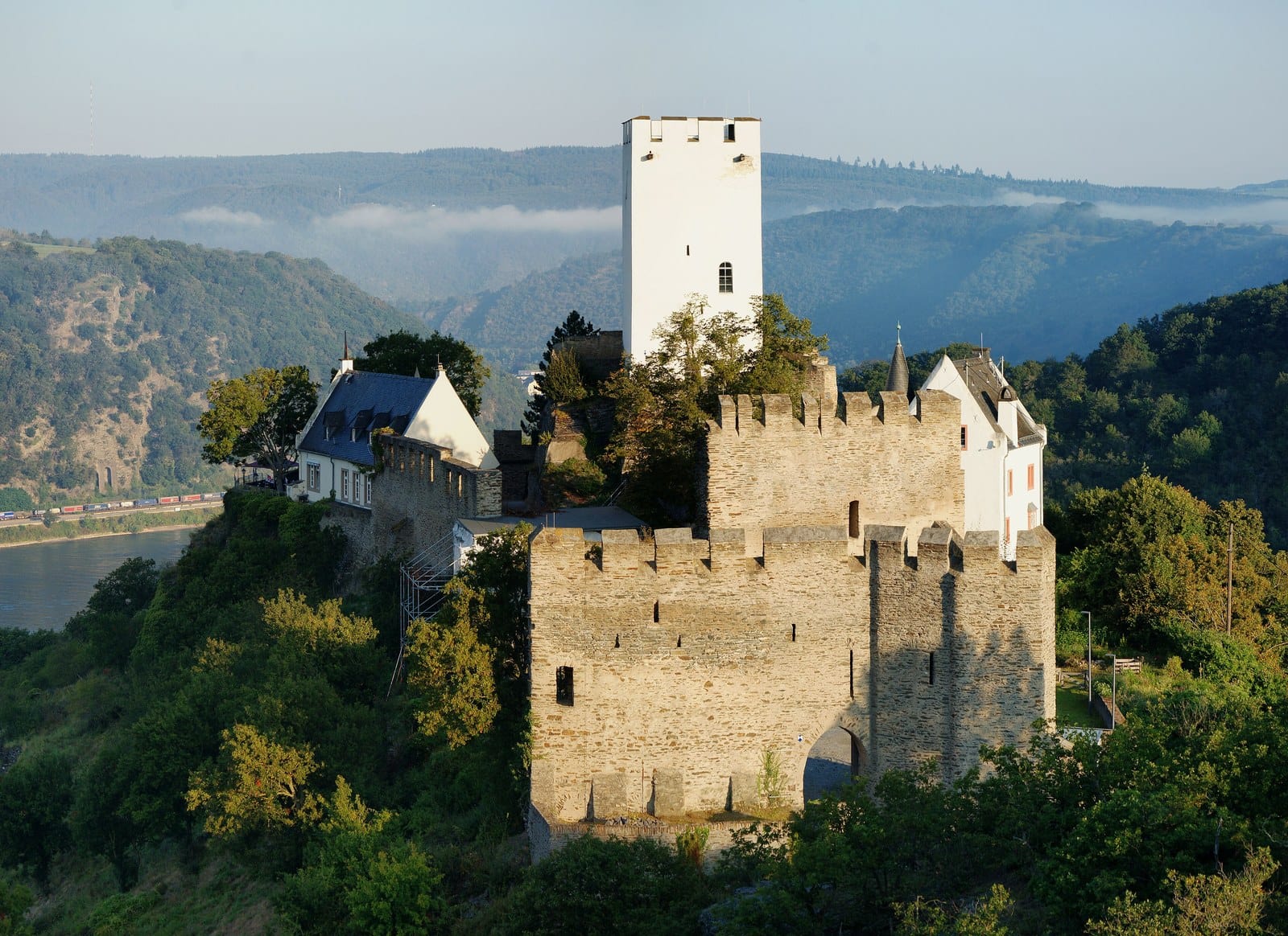 Sterrenberg Castle 3 Sterrenberg Castle seen from the higher ridge of Liebenstein, with the Rhine and the Loreley reach in the distance