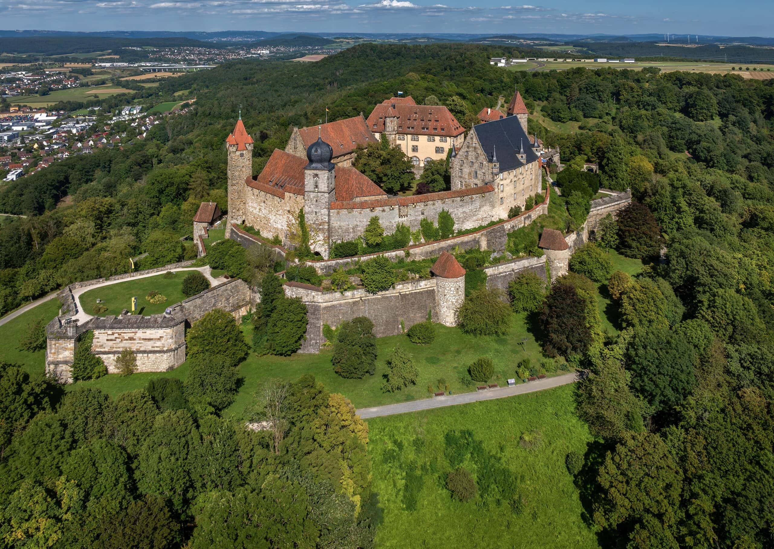 Castles of Franconia: Seven Princely Seats Across the Region 9 Aerial view of Veste Coburg in Upper Franconia, showing the ducal fortress complex on its dolomite ridge.
