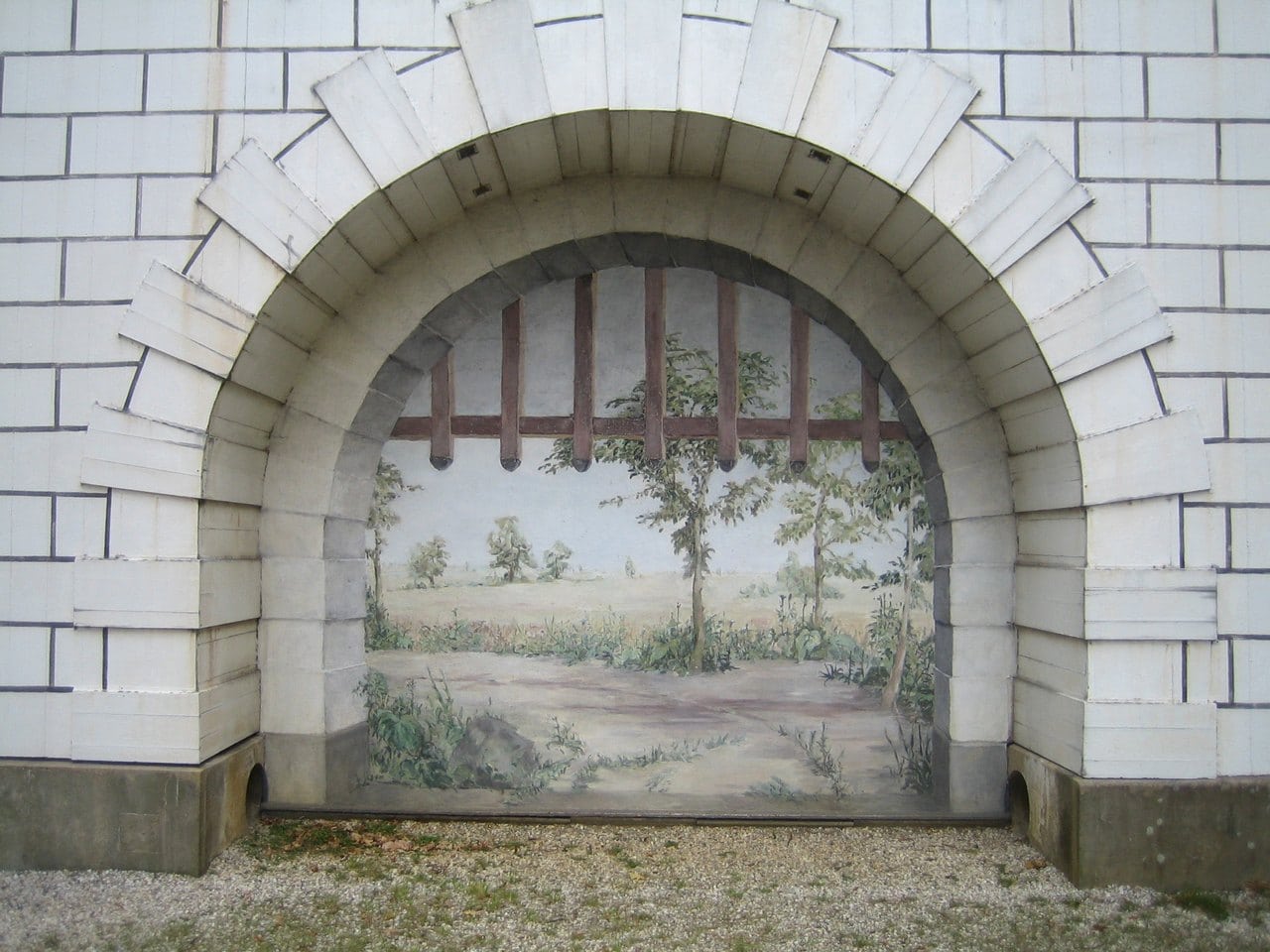 Pfaueninsel Palace 3 Trompe-l'oeil painted archway on Pfaueninsel Palace imitating a ruined gateway