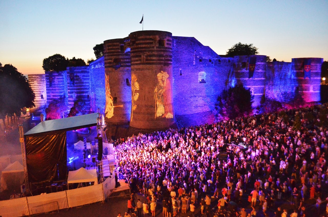 The Château d'Angers floodlit with the Apocalypse projected on its towers