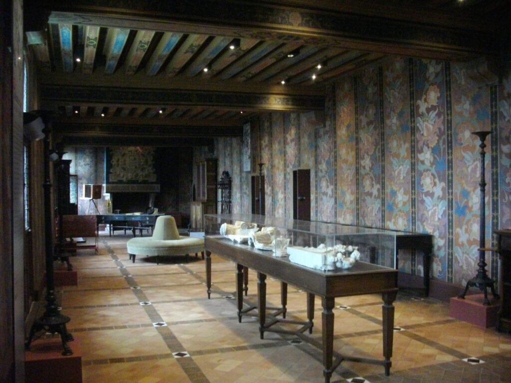 Château de Blois 14 The queen's chamber at Château de Blois with a crowned monogram above the fireplace