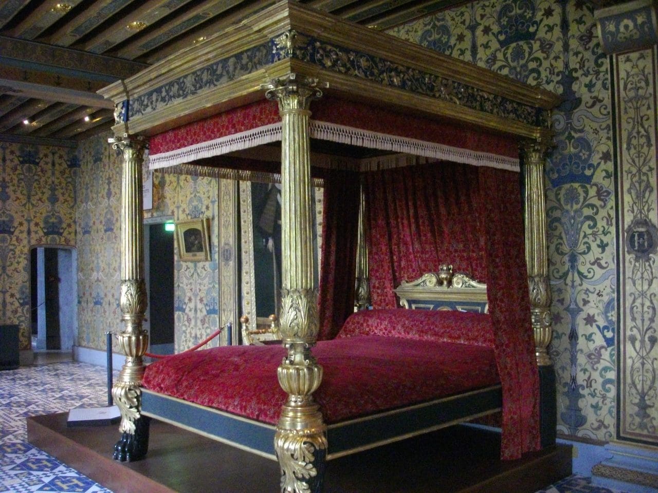 Château de Blois 7 The royal chamber at Château de Blois with a crimson canopied bed