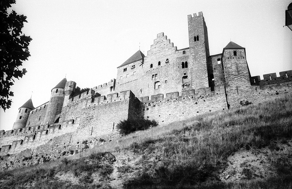 The walled Cité from the fields — Swedish National Heritage Board, no restrictions The full sweep of the walled Cité de Carcassonne seen across the fields
