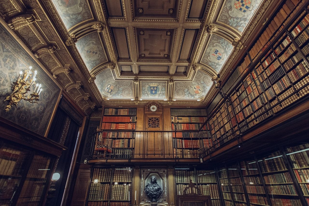 Cabinet des Livres, Chantilly — Gabriel Ghnassia, CC0 The Cabinet des Livres, the galleried library of the Château de Chantilly