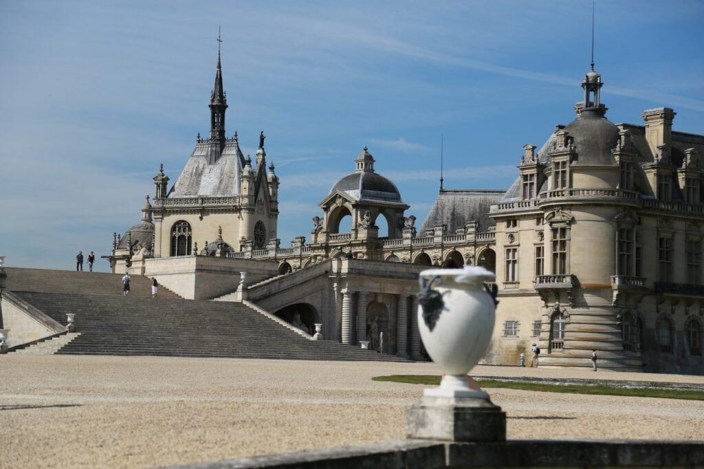 Château de Chantilly 10 The terrace approach to the Château de Chantilly with the chapel spire