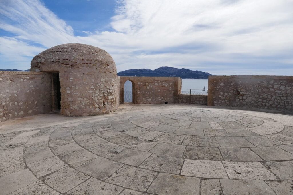 Rooftop terrace of Château d'If with compass-rose paving.