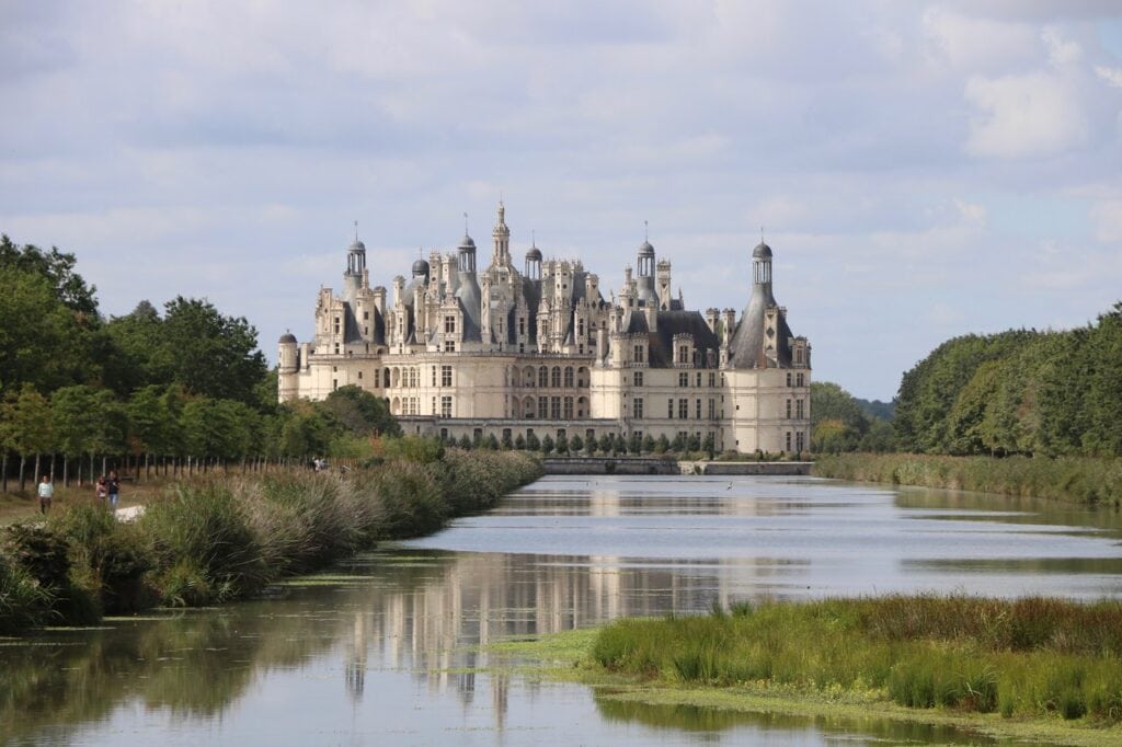 Château de Chambord 15 Distant view of Chateau de Chambord along a canal