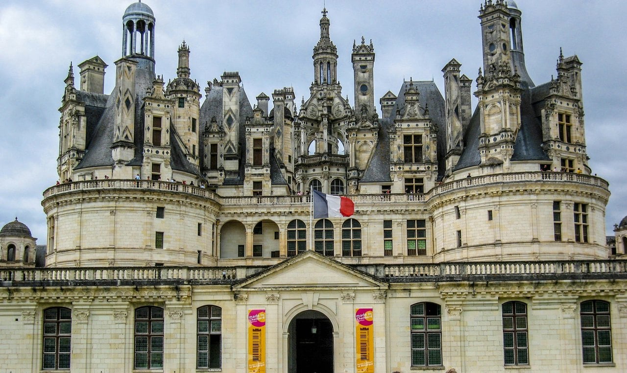 Roofline of chimneys and turrets — Kathy Lipps / Unsplash Detail of the roofline of Chateau de Chambord with chimneys and turrets