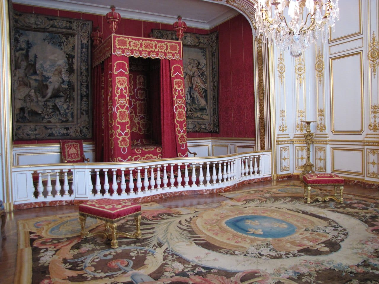 Château de Chambord 7 A red and gold state bedchamber in the royal apartments of Chateau de Chambord