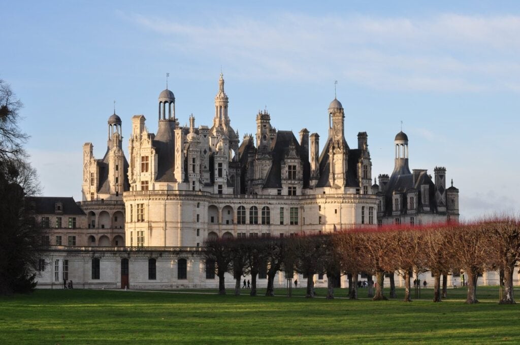 Château de Chambord 16 Chateau de Chambord across a summer meadow