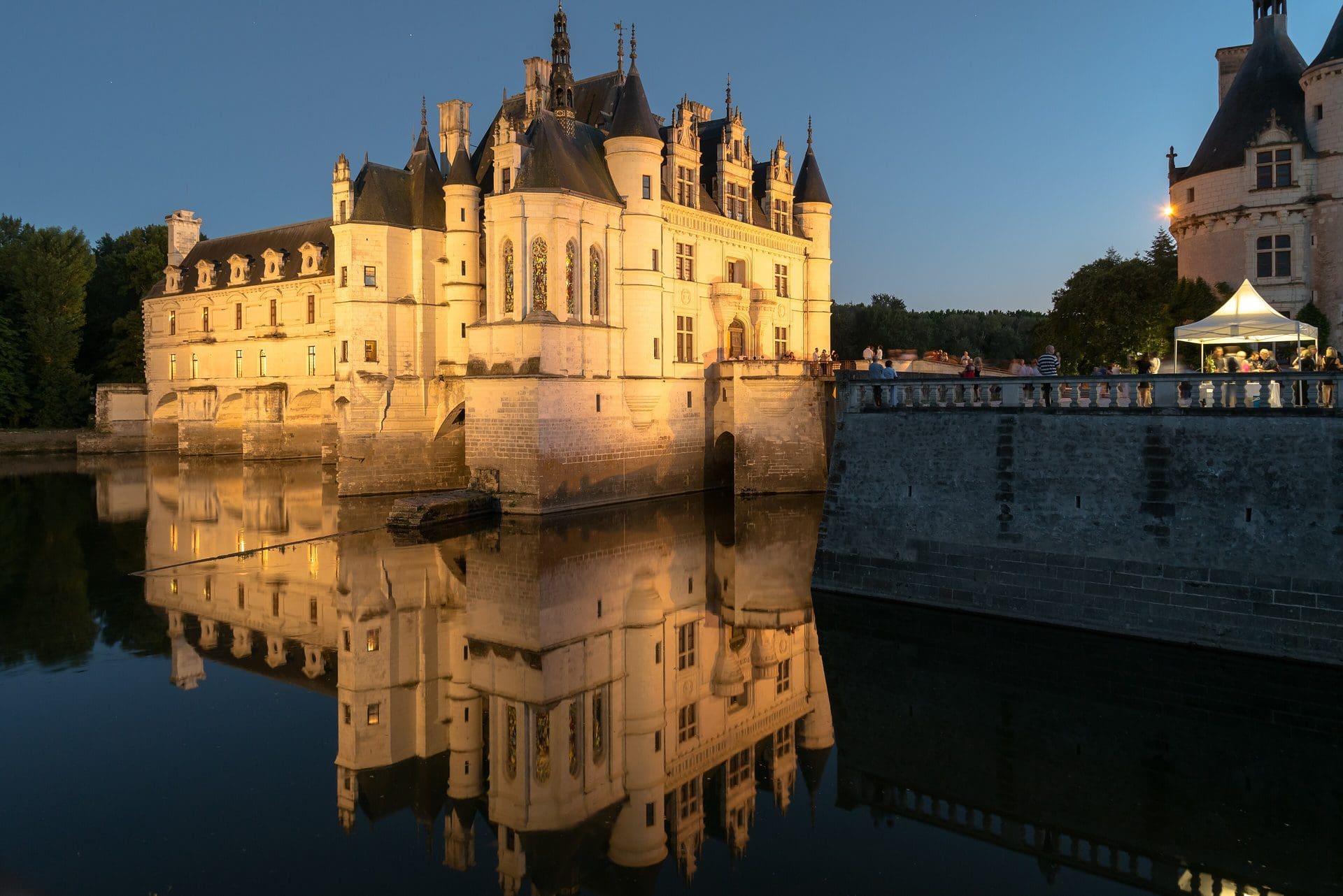 Château de Chenonceau 1 Chateau de Chenonceau reflected in the river Cher at golden hour, east facade