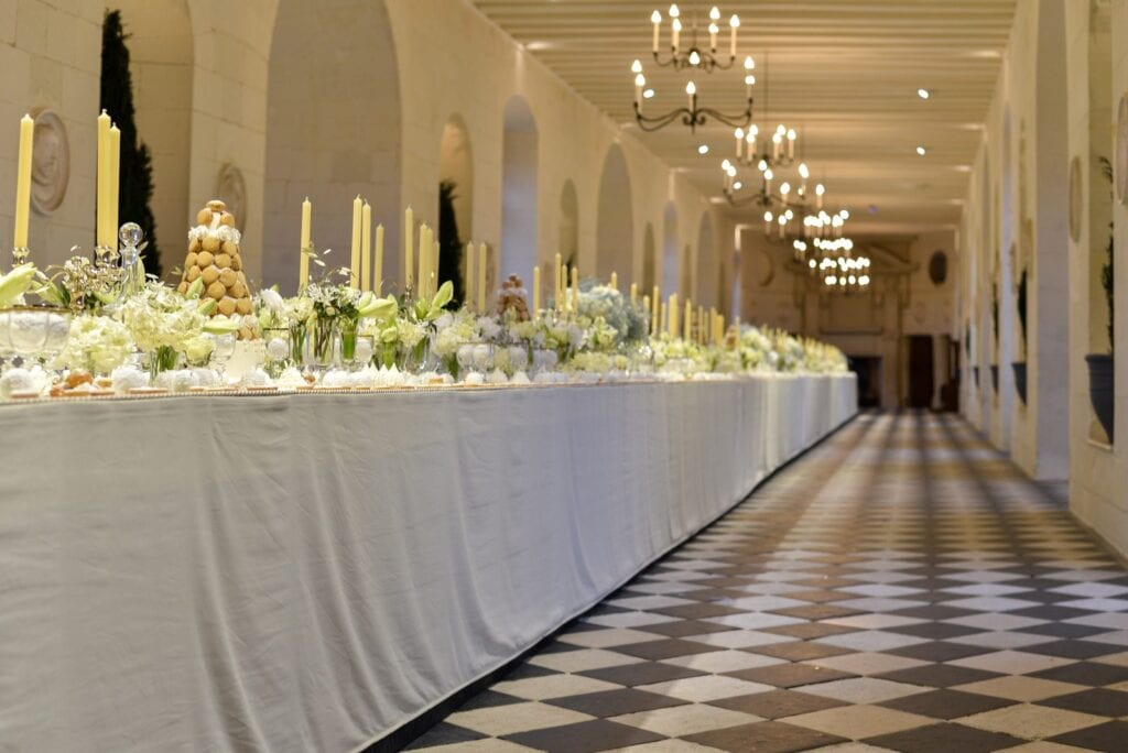 Château de Chenonceau 17 The gallery of Chateau de Chenonceau laid with a long candlelit banquet table