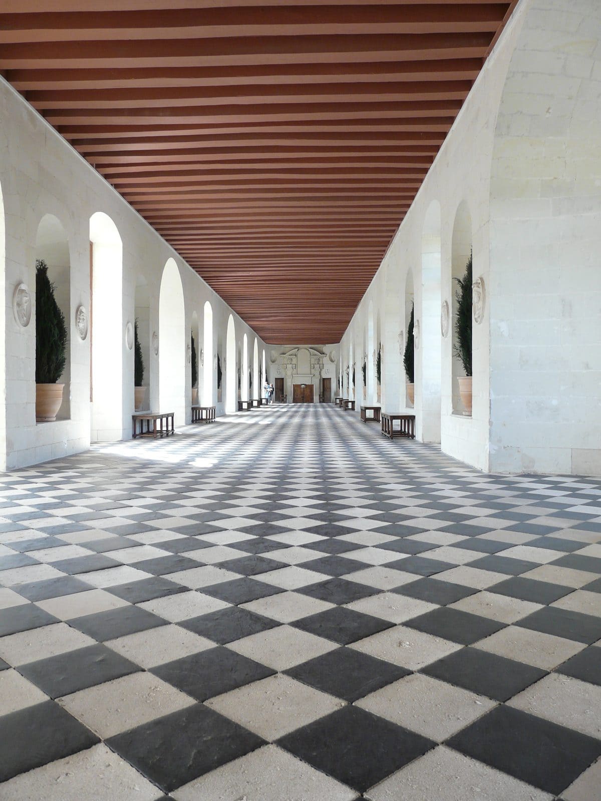 Château de Chenonceau 4 The grand gallery interior of Chateau de Chenonceau with black and white checkerboard floor over the river Cher