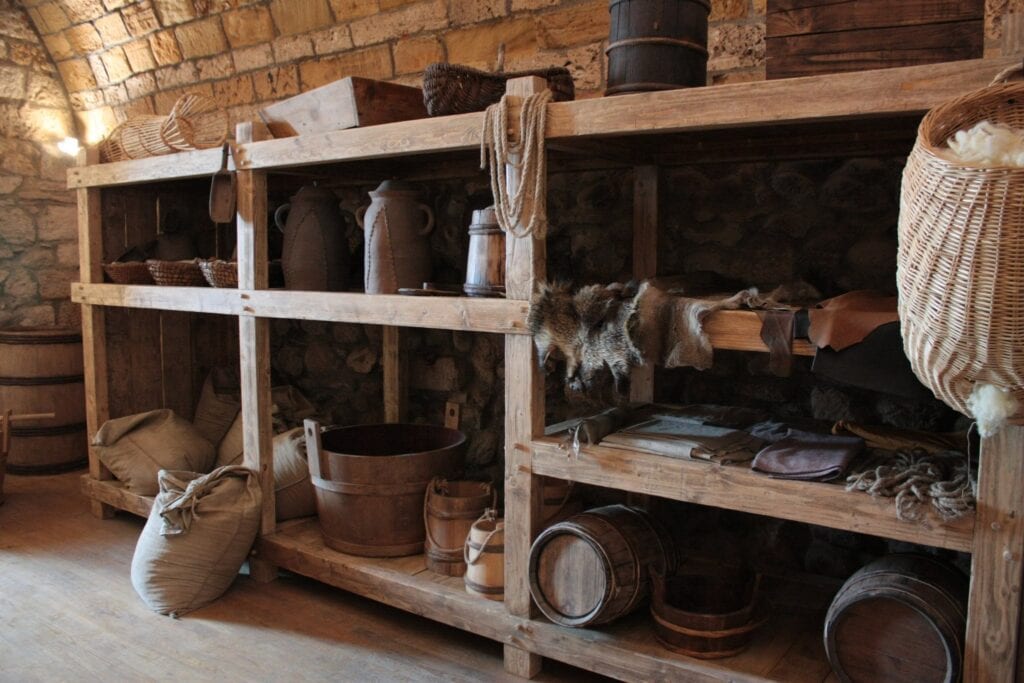 Château de Foix 11 A reconstructed storeroom with barrels and baskets at Château de Foix