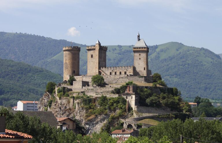Château de Foix 6 Château de Foix, its three medieval towers rising above the town and the Pyrenees