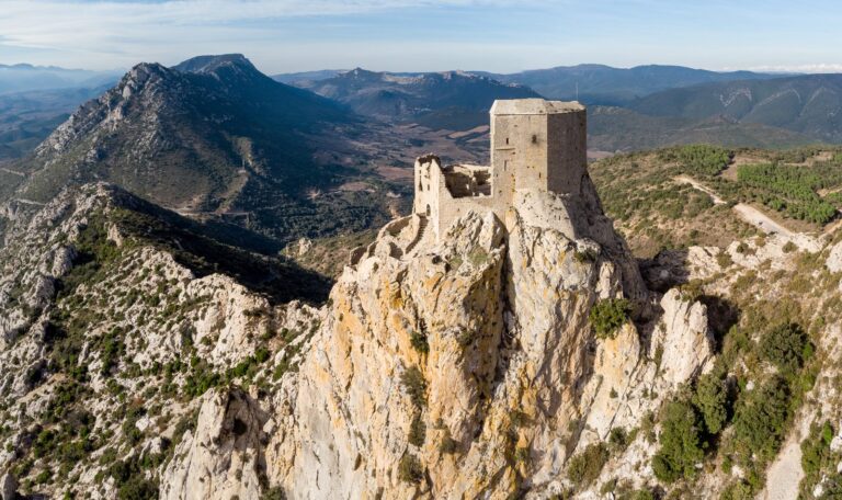 Château de Quéribus 7 Aerial view of Château de Quéribus on its rock pinnacle in the Corbières
