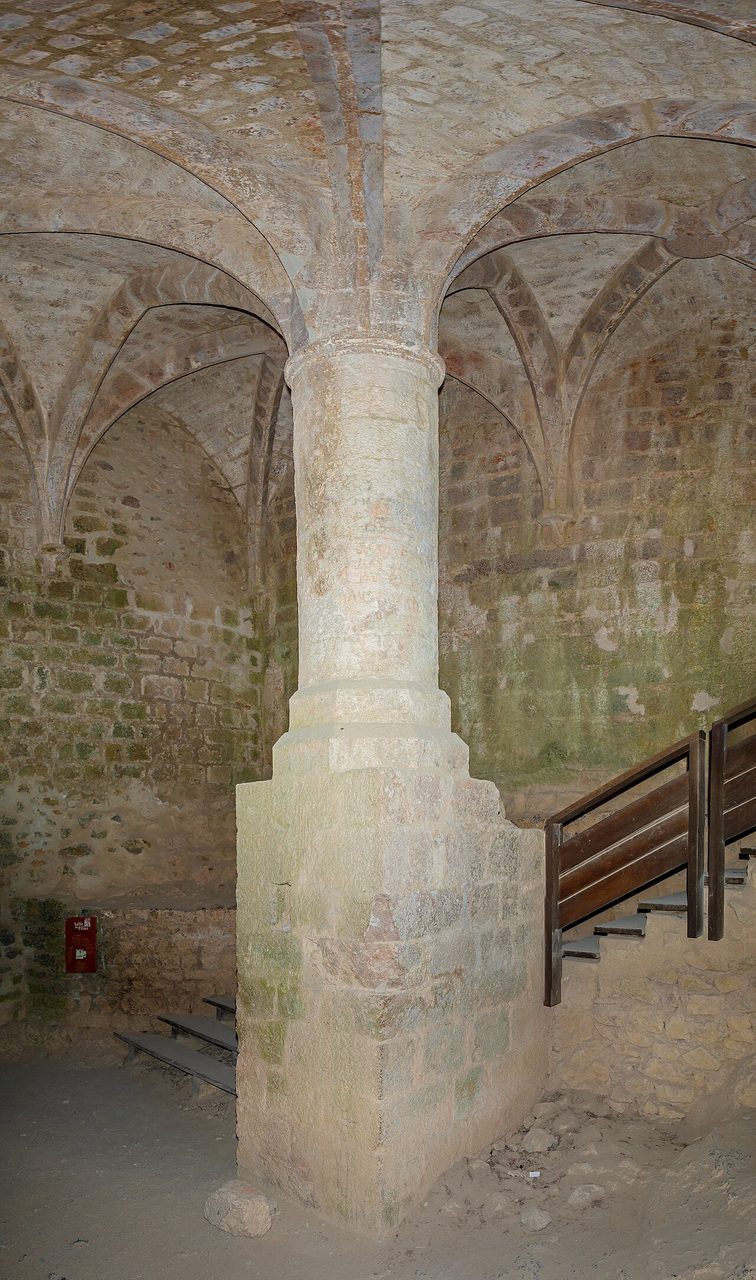 The Salle du Pilier with ribbed vaulting springing from a single off-center pillar