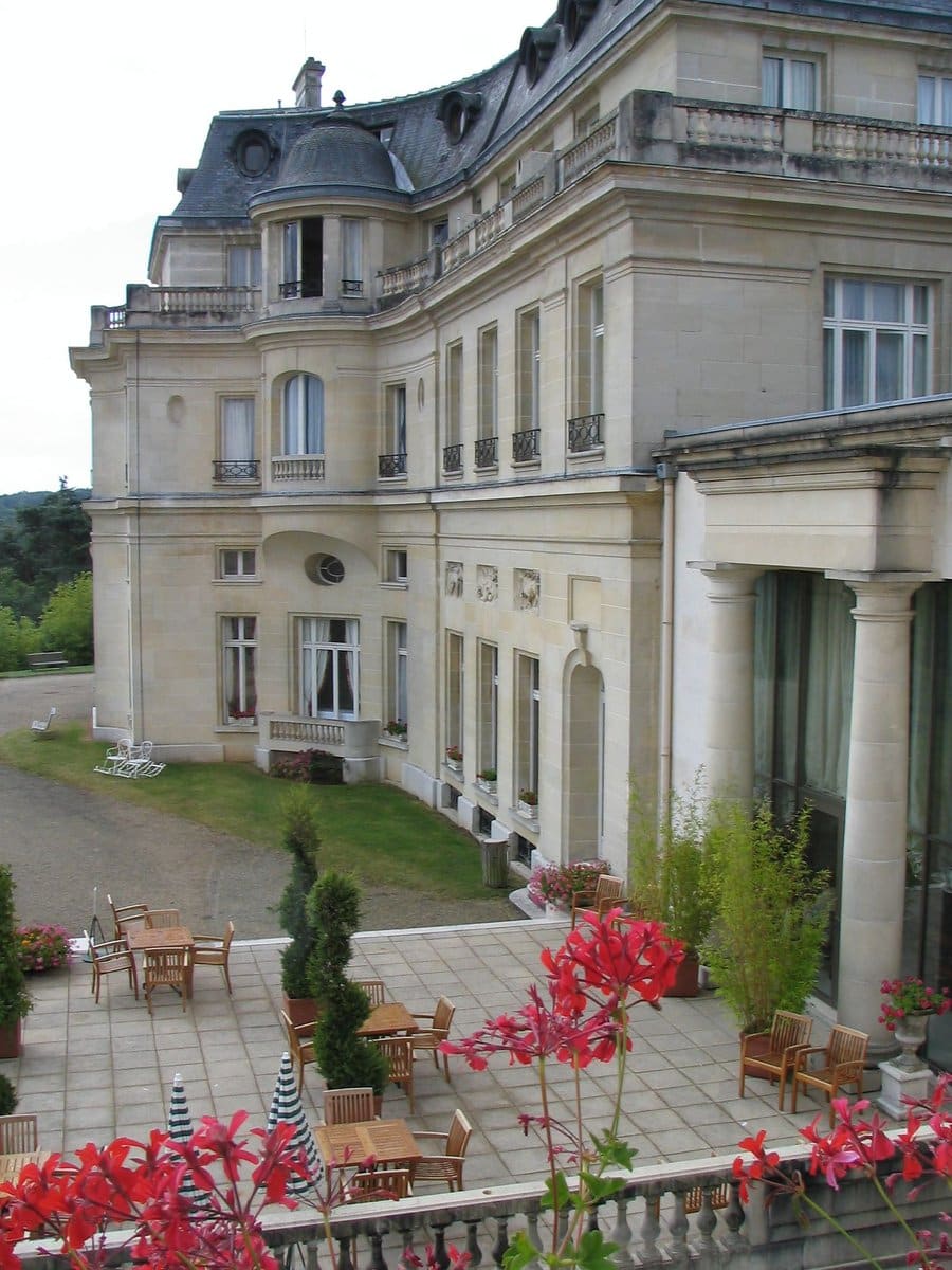 Castle Hotels Near Paris: Where You Can Actually Sleep in a Château 7 The garden front of the Château Mont Royal hotel near Chantilly