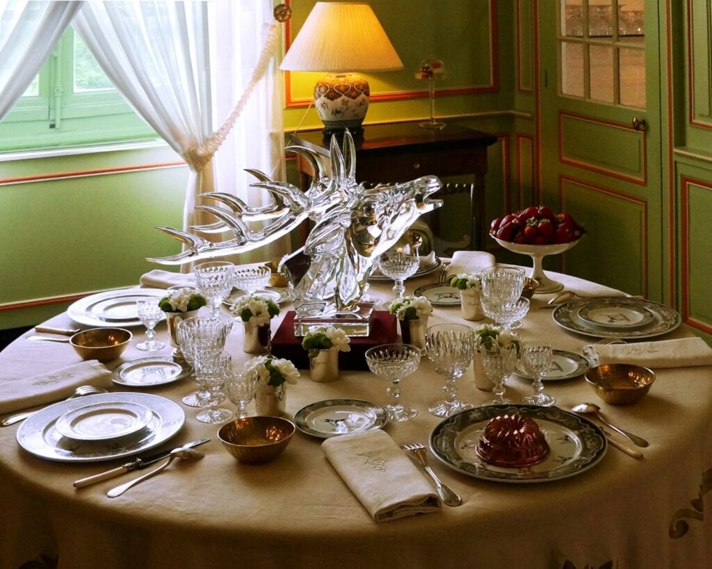 Château de Cheverny 14 Family dining table in the private apartments of Cheverny set around a Baccarat crystal stag