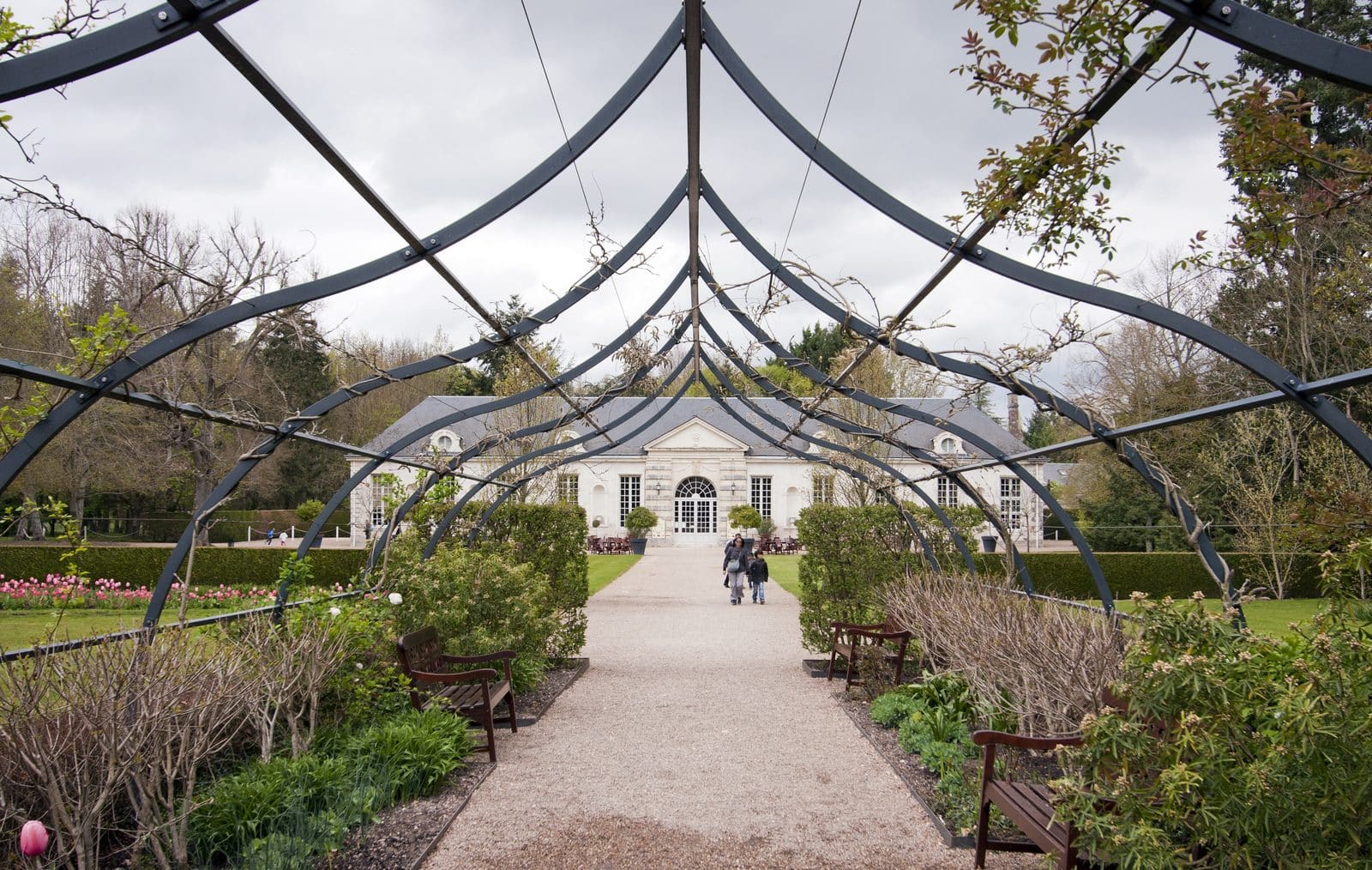 Château de Cheverny 9 The eighteenth-century Orangerie at Cheverny seen through the Garden of Love arbor