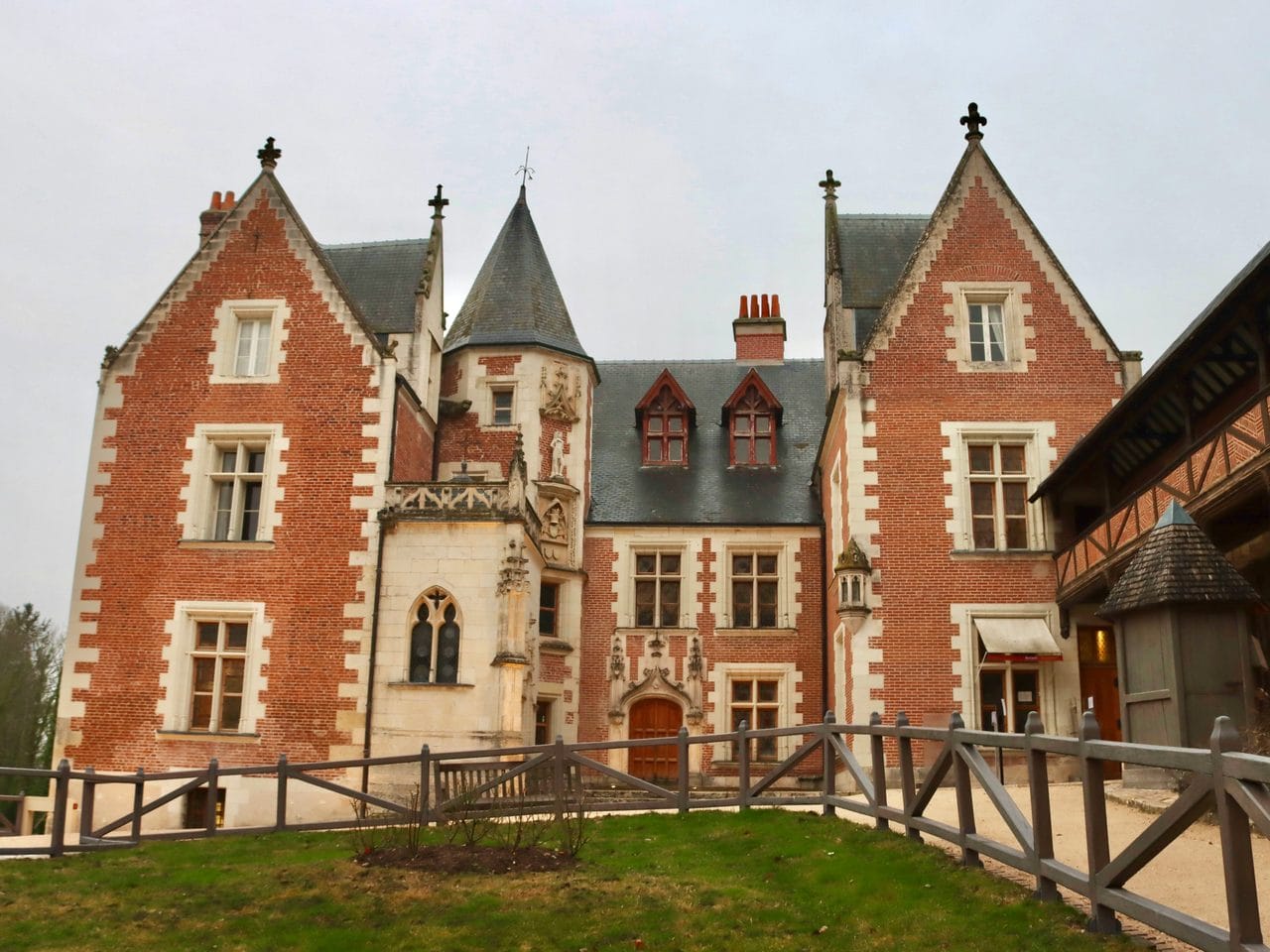 The front facade — Hongbin, Unsplash Front facade of Château du Clos Lucé in winter light