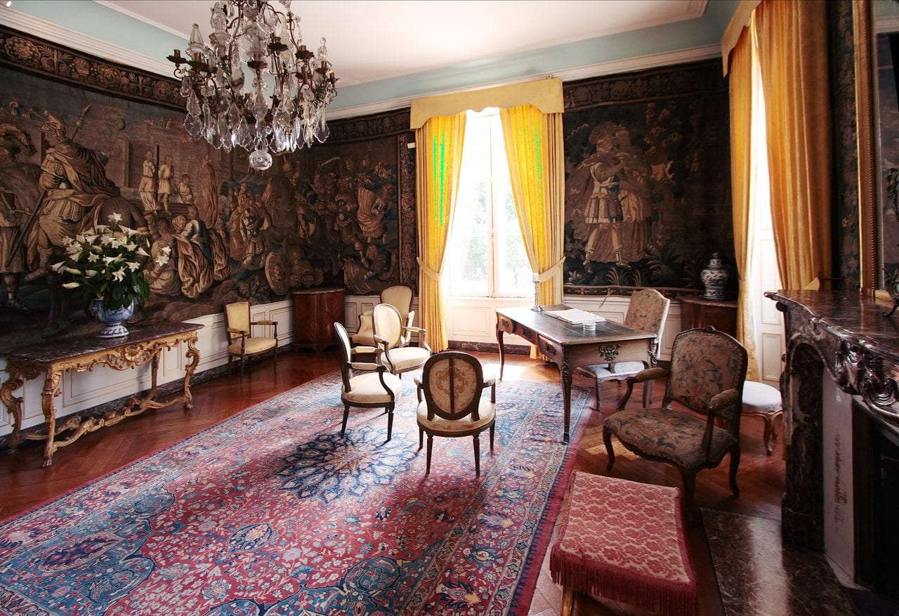 Château du Clos Lucé 10 Eighteenth-century salon of Château du Clos Lucé hung with verdure tapestries