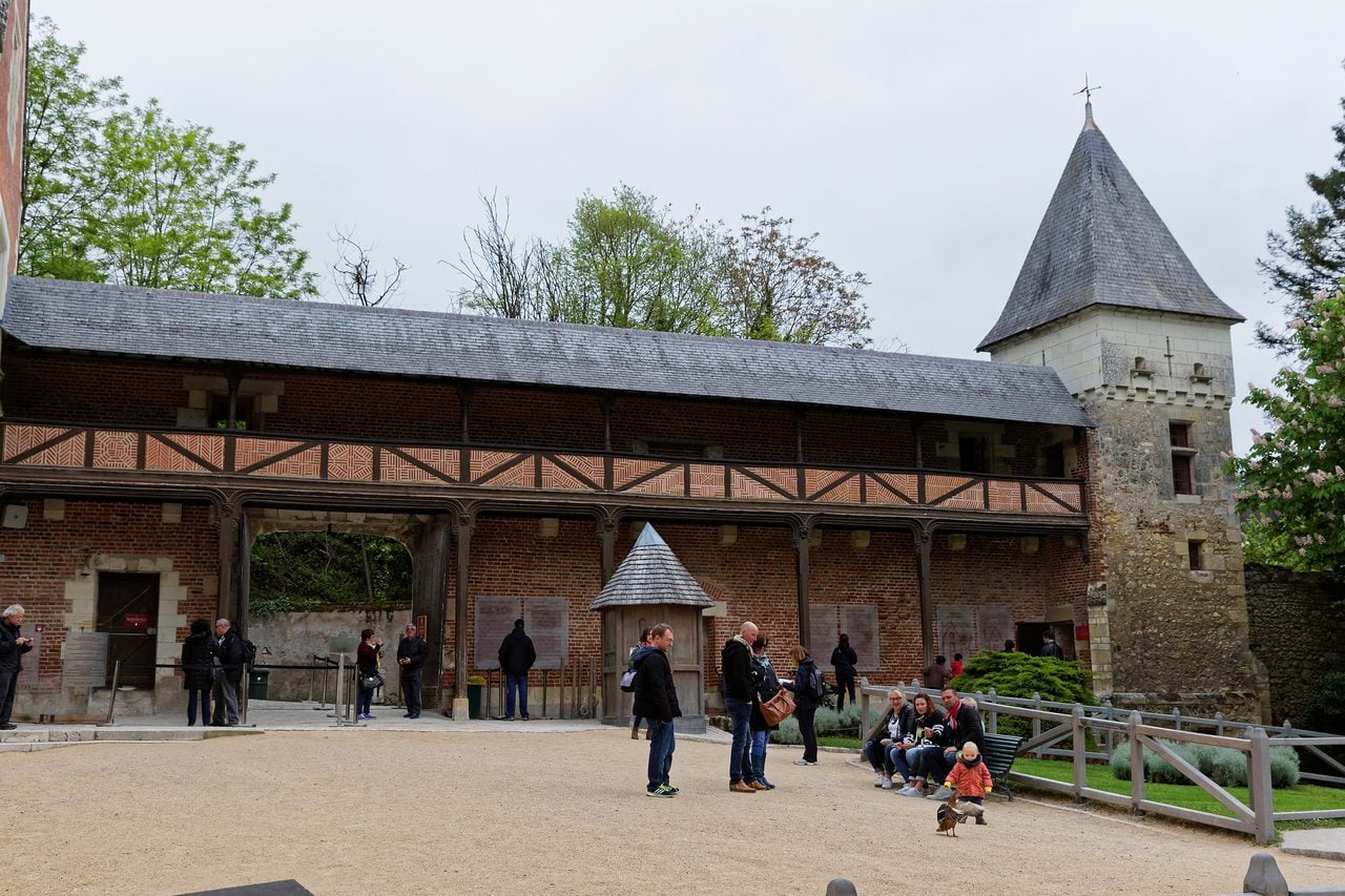 Château du Clos Lucé 2 Courtyard of Château du Clos Lucé with the half-timbered covered gallery and square watchtower