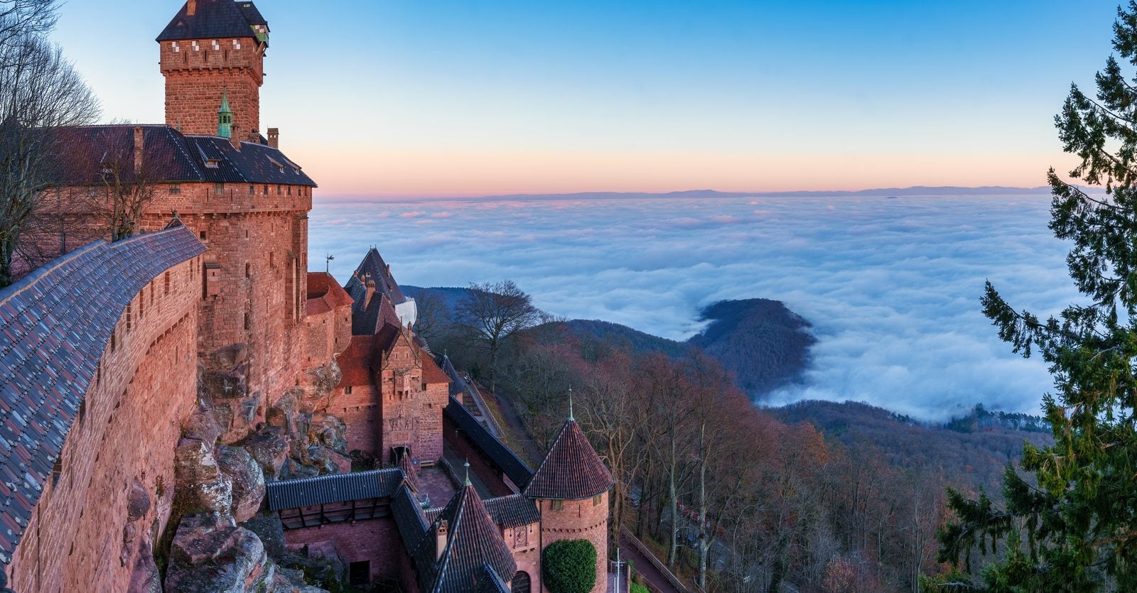 Château du Haut-Kœnigsbourg at sunrise above a sea of cloud