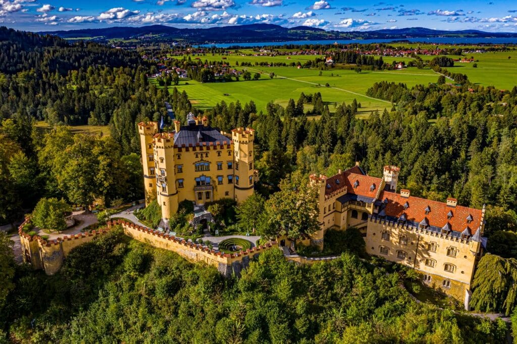 Hohenschwangau Castle 4 Aerial view of Hohenschwangau Castle, the Alpsee and the Allgau plain