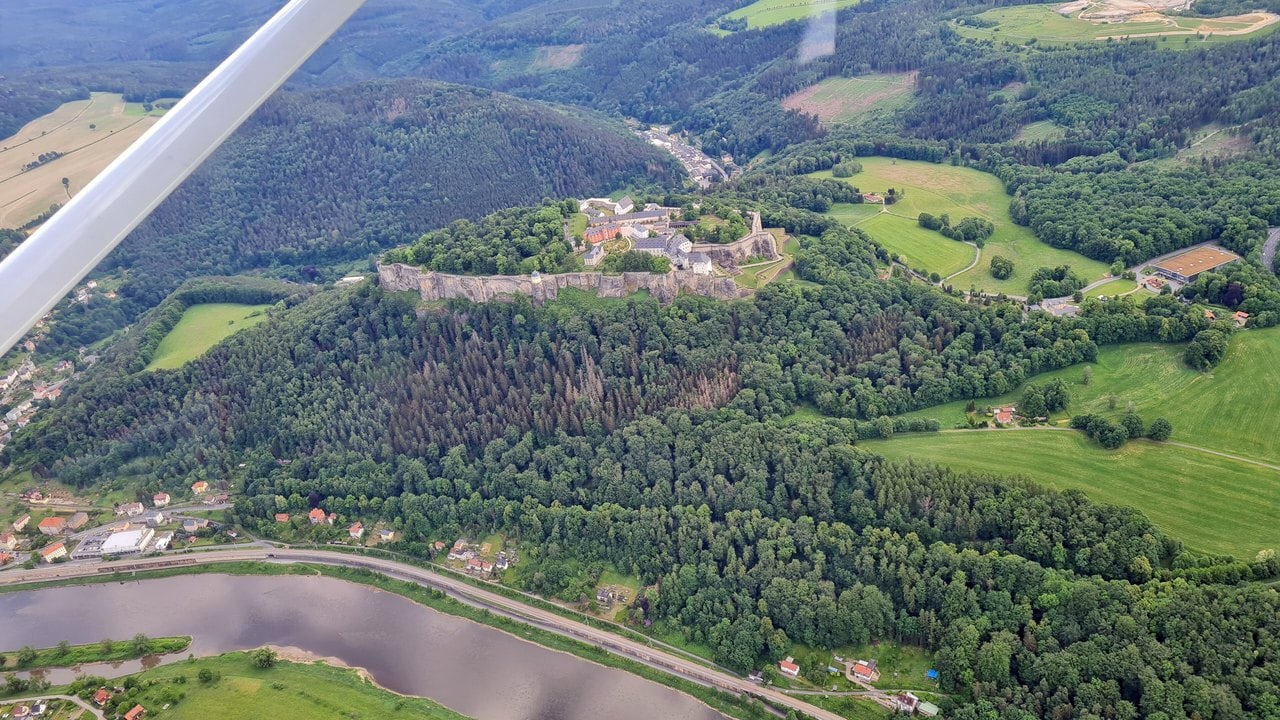 Königstein Fortress 2 Aerial view of Königstein Fortress filling its plateau above the Elbe and the town