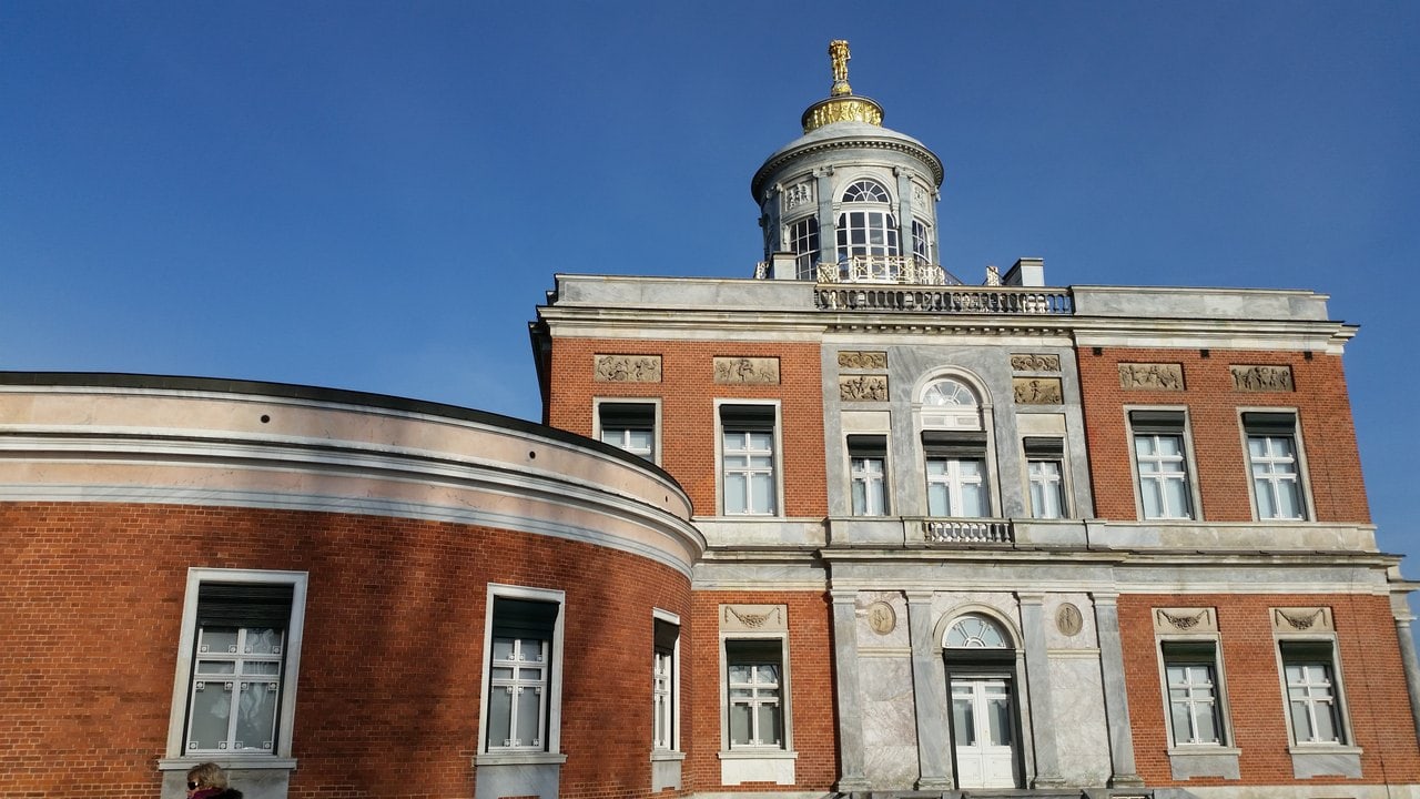 Marble Palace 3 Brick dressed with gray-blue Silesian marble, antique reliefs, and the rooftop belvedere