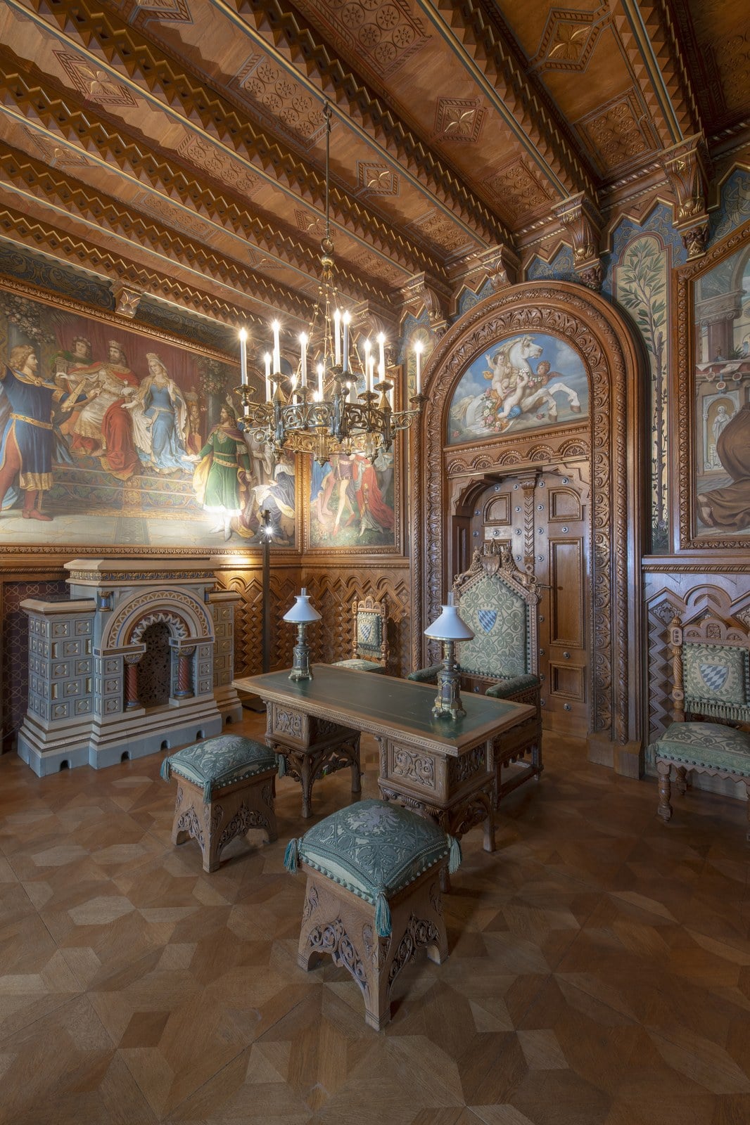 Neuschwanstein Castle 10 The Study of Neuschwanstein Castle, paneled in oak with Tannhäuser murals, a tiled stove, and a writing desk
