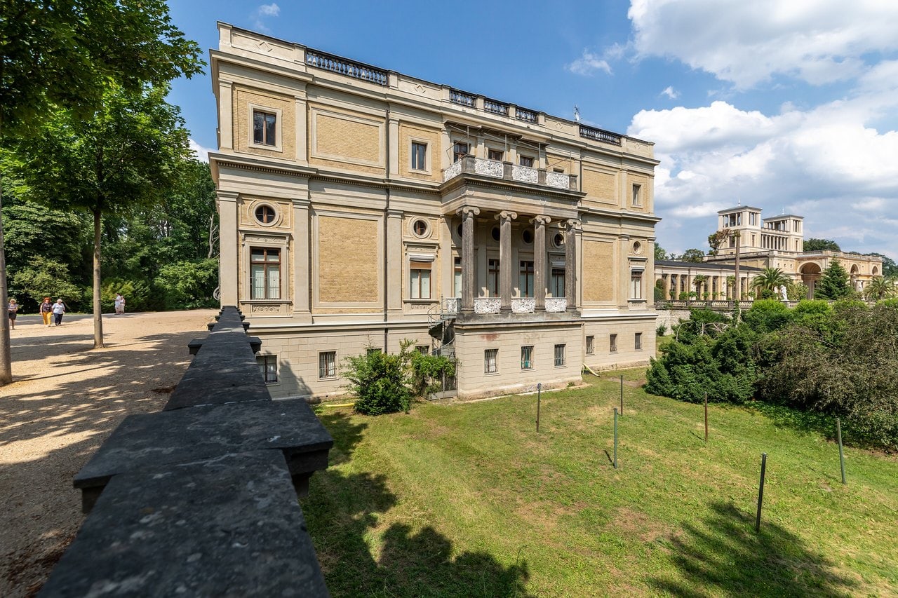 Orangery Palace 1 The Orangery Palace in Sanssouci Park, Potsdam, seen in three-quarter view from a terrace, its Italianate end block in front and the twin belvedere towers beyond
