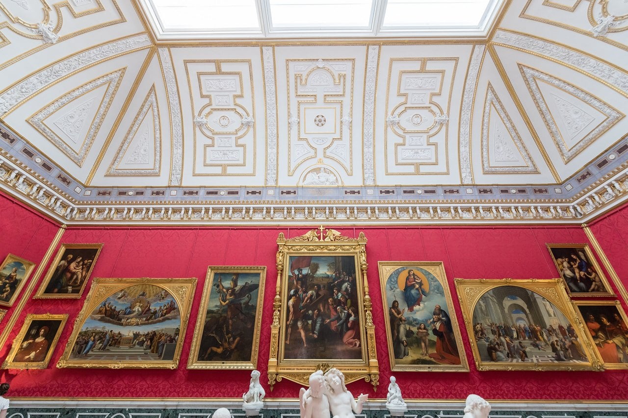 Orangery Palace 5 The skylit Raphael Hall in the Orangery Palace, its red silk walls hung with framed copies of paintings by Raphael